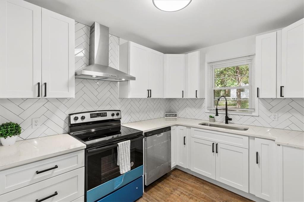 3406 Jackson Drive Decatur, GA 30032 - Photo 10 of 28 a kitchen with cabinets appliances a sink and a window