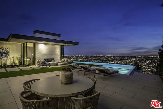 a view of a swimming pool and outdoor space