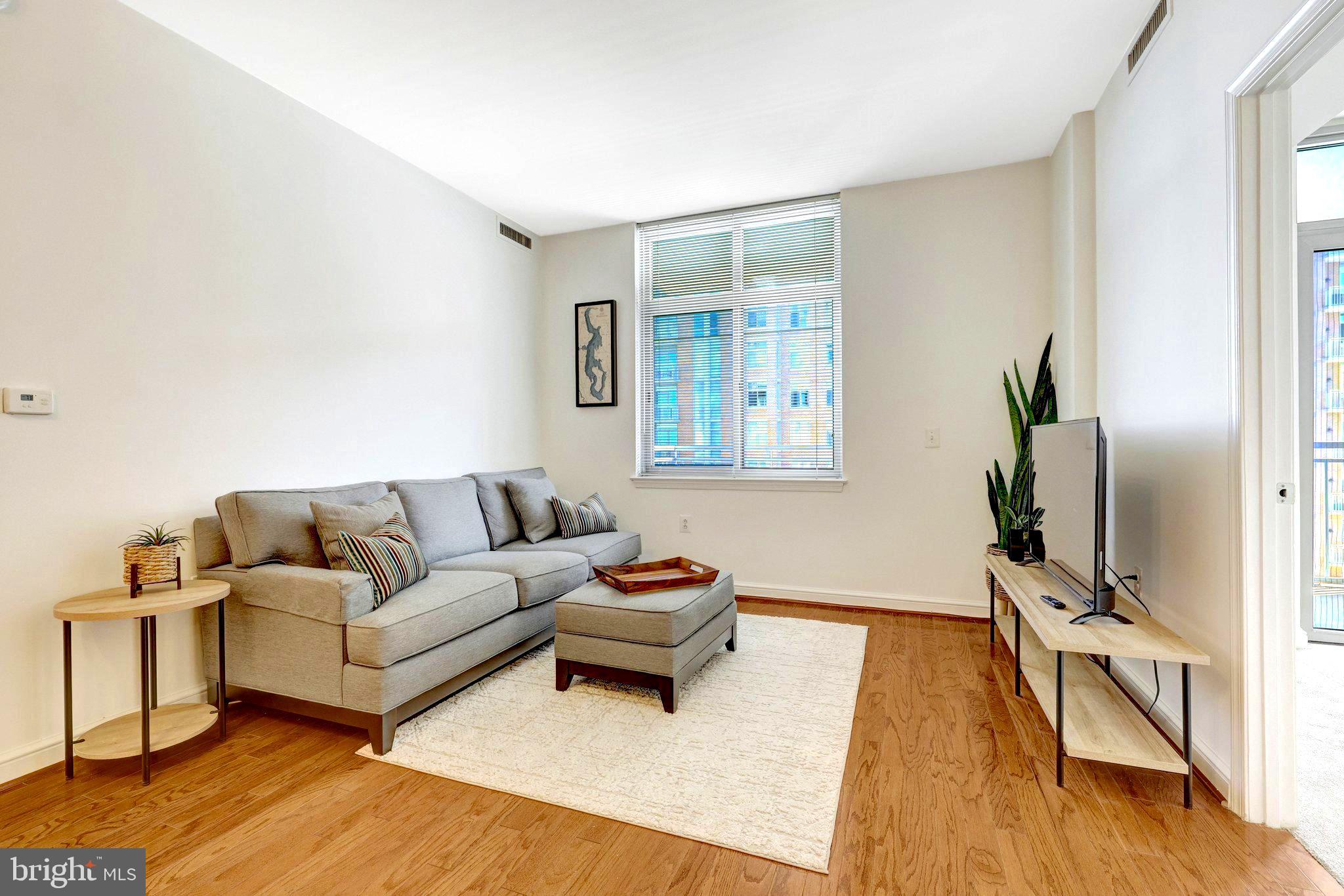 11990 Market Street, Unit 818 Reston, VA 20190 - Photo 12 of 55 Living Room