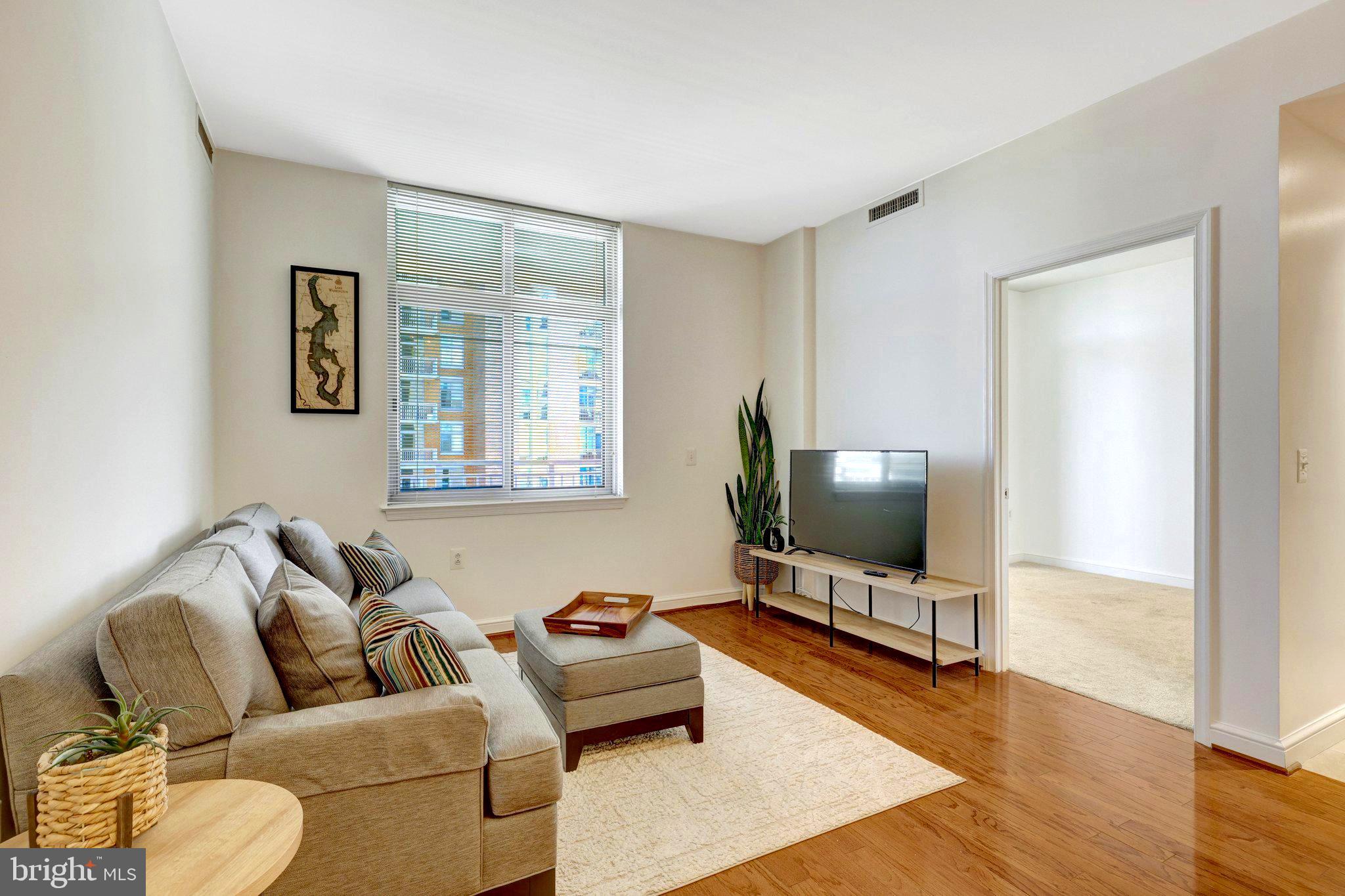 11990 Market Street, Unit 818 Reston, VA 20190 - Photo 13 of 55 Living Room