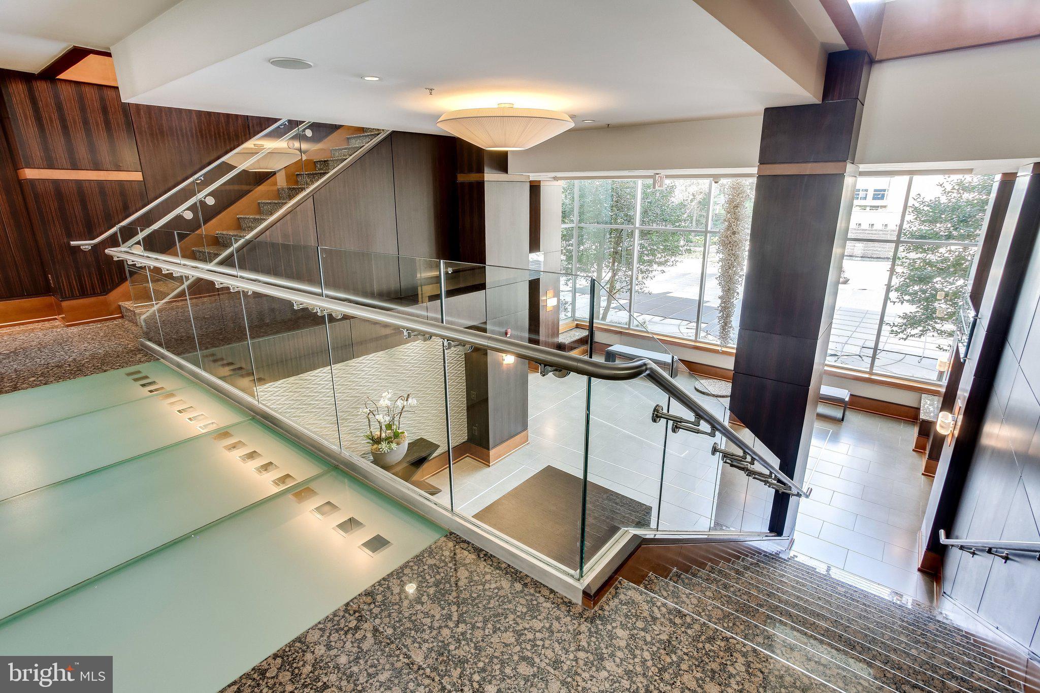 11990 Market Street, Unit 818 Reston, VA 20190 - Photo 38 of 55 Staircase to upper level amenities