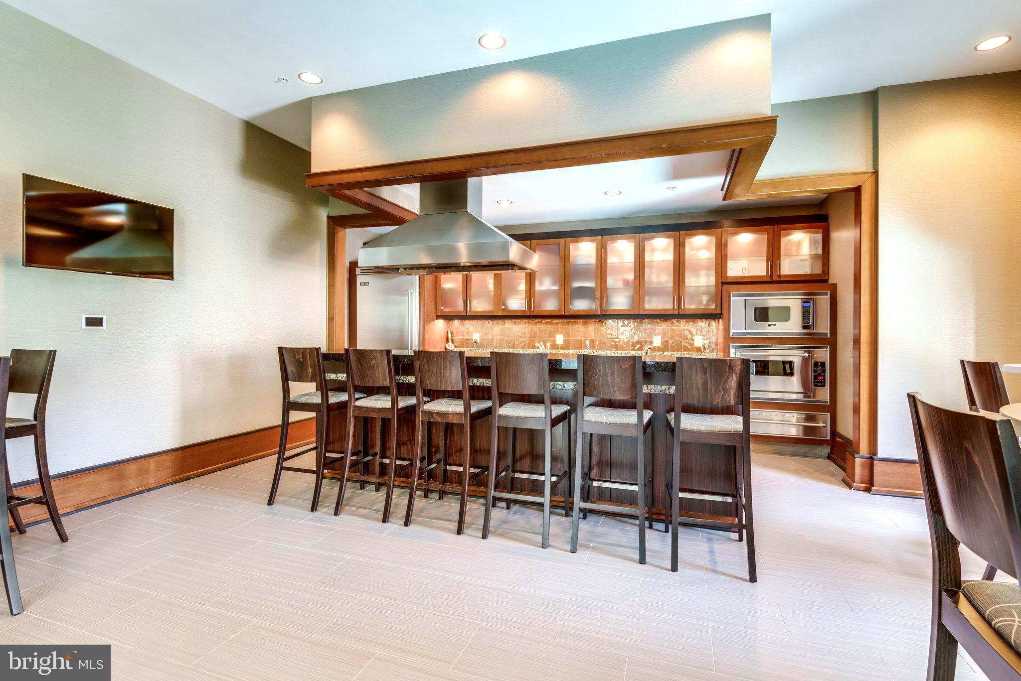 11990 Market Street, Unit 818 Reston, VA 20190 - Photo 43 of 54 a view of a dining room with furniture window and outside view