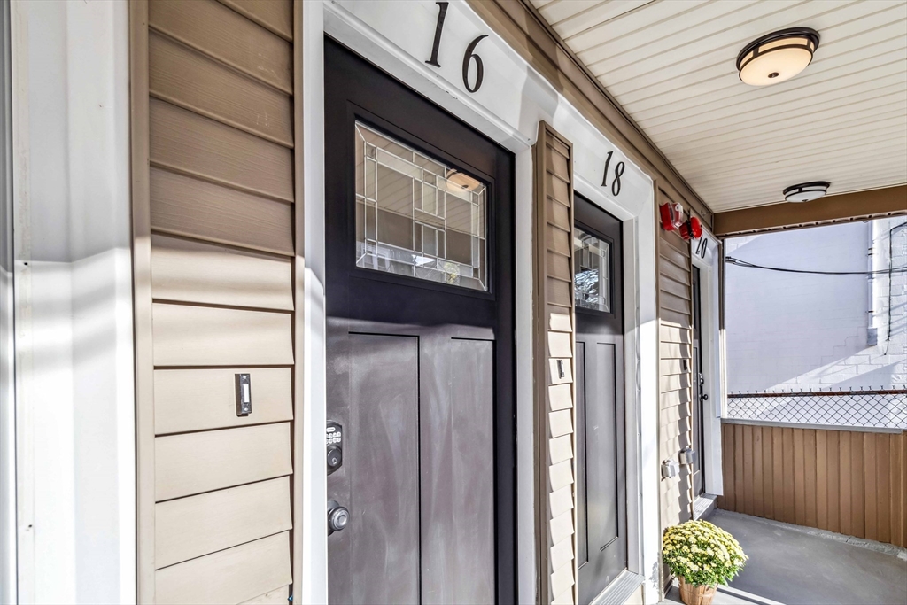16 Alston Street, Unit 16 Somerville, MA 02143 - Photo 1 of 39 a front view of a building with entryway