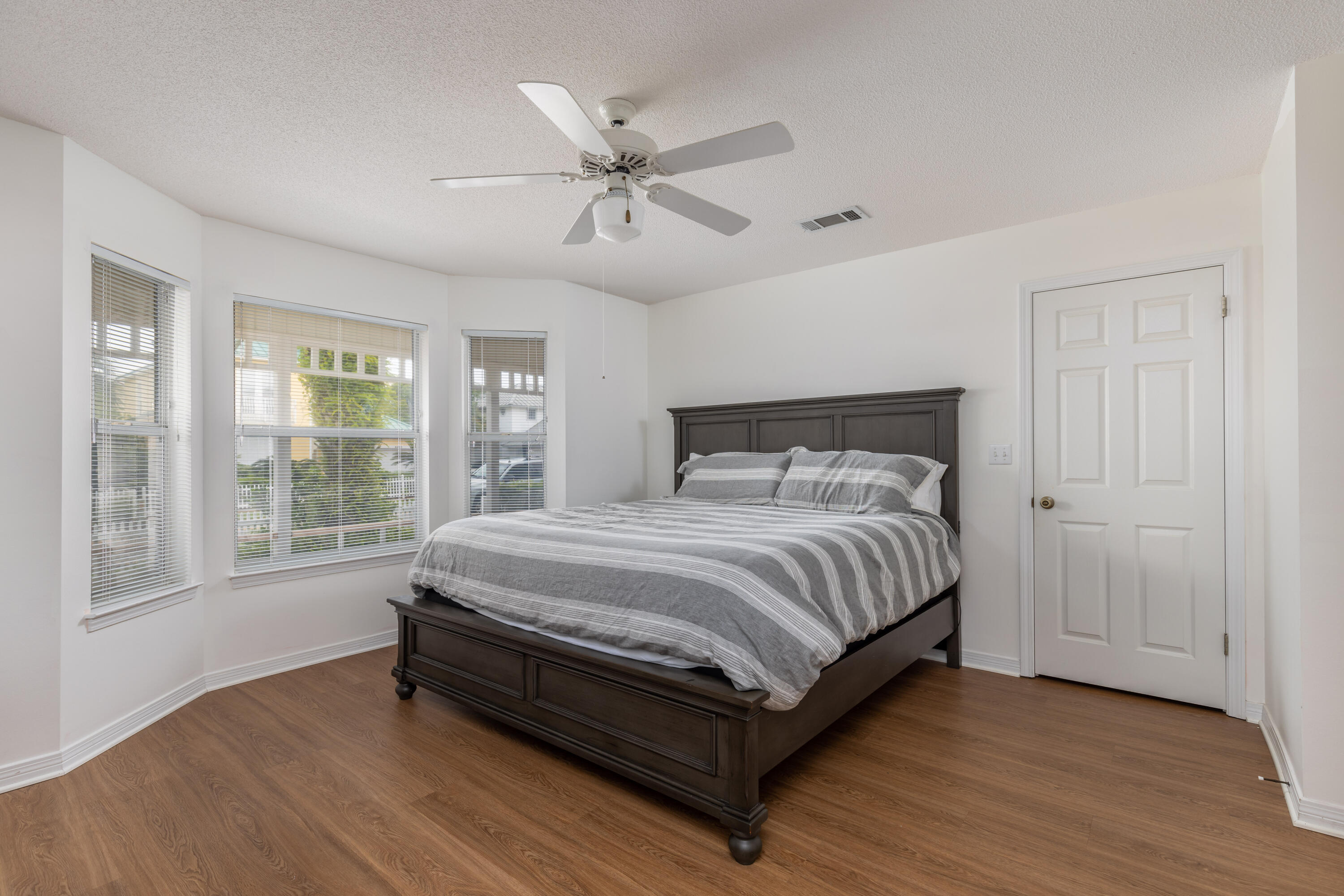 4450 Ocean View Drive Destin, FL 32541 - Photo 23 of 34 a bedroom with a bed a window and closet
