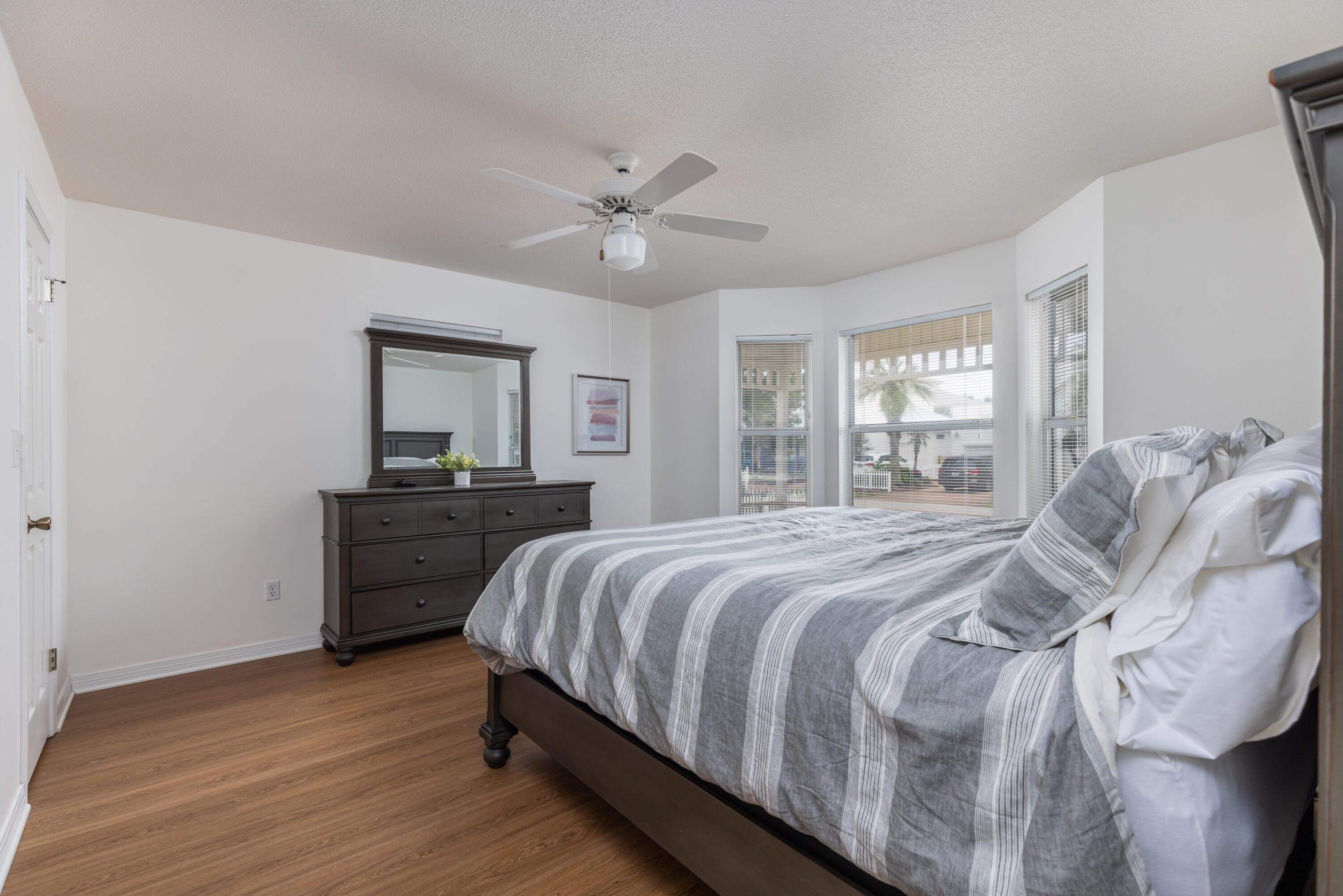 4450 Ocean View Drive Destin, FL 32541 - Photo 24 of 34 a bedroom with a large bed and a tv