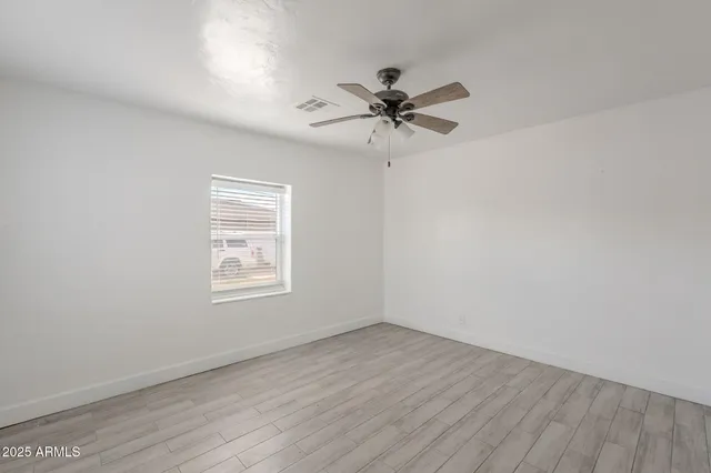 a bathroom with a sink and a window