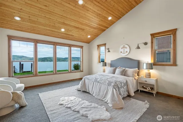 a bathroom with a toilet and shower