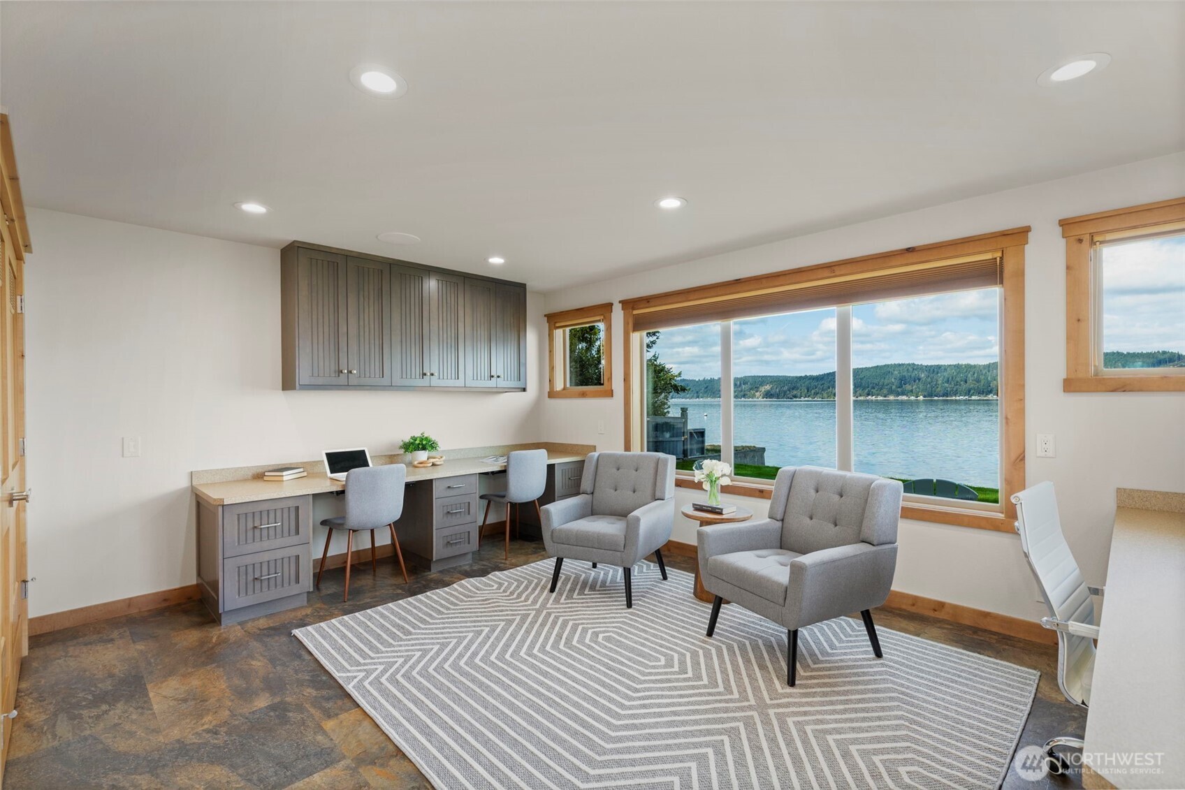14341 Highway 106 Belfair, WA 98528 - Photo 17 of 40 a living room with furniture a large window and a table
