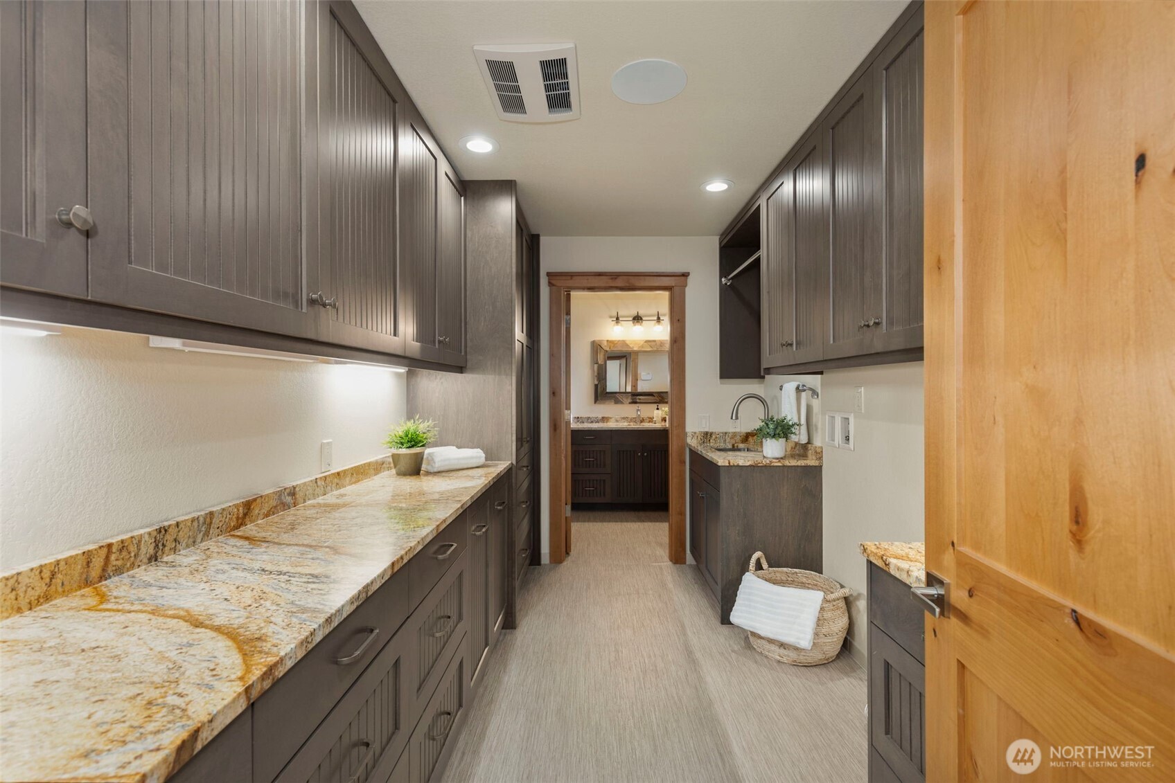 14341 Highway 106 Belfair, WA 98528 - Photo 19 of 40 a kitchen with a sink stove and refrigerator