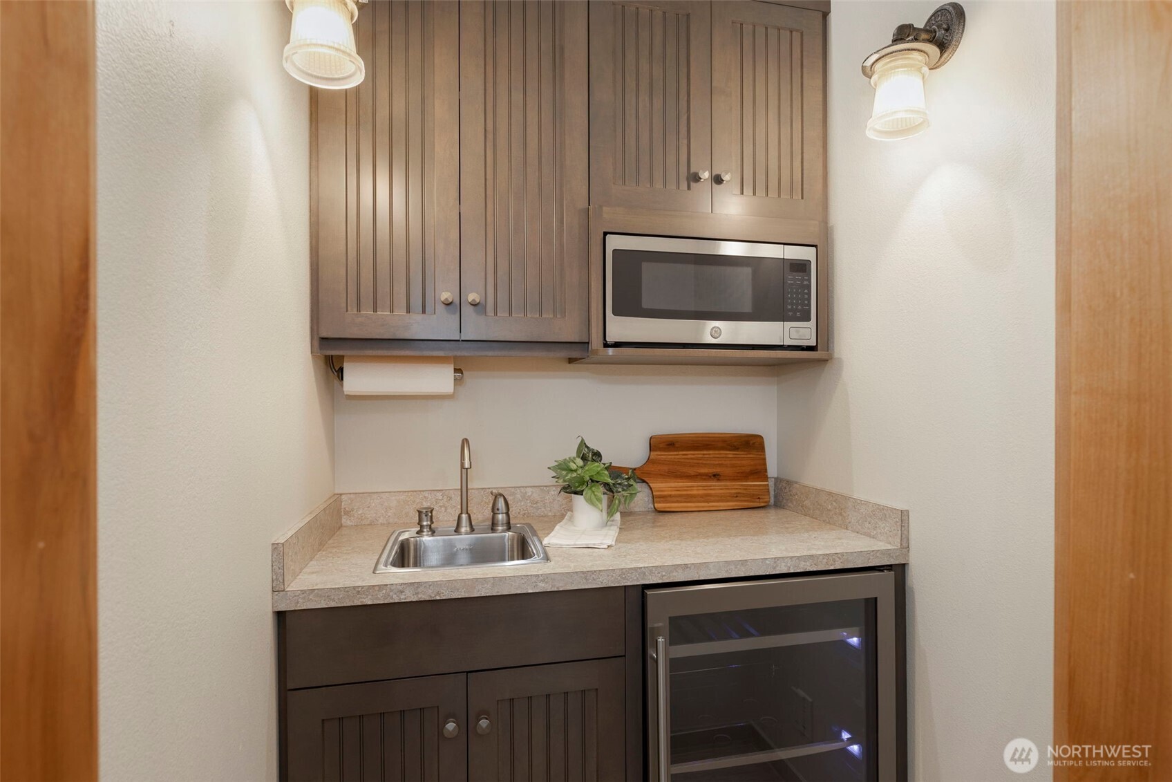 14341 Highway 106 Belfair, WA 98528 - Photo 31 of 40 a kitchen with stainless steel appliances a stove a microwave and sink
