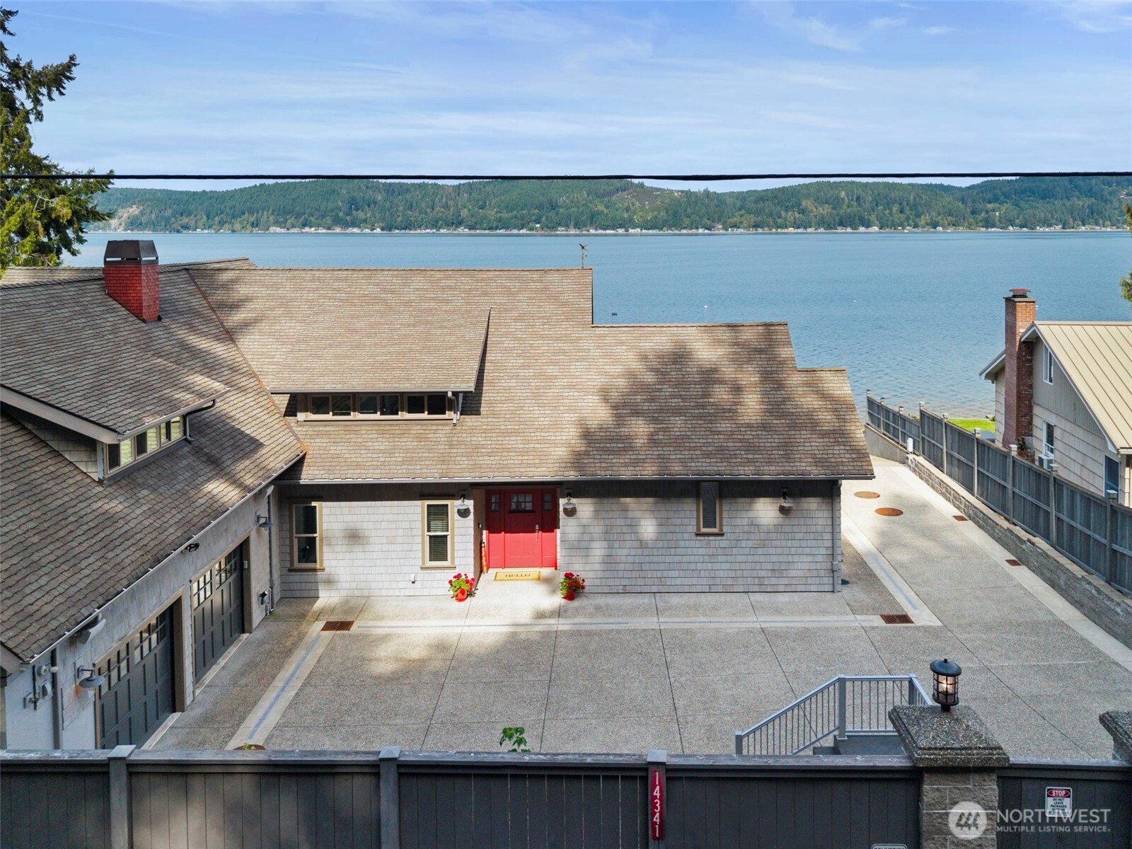 14341 Highway 106 Belfair, WA 98528 - Photo 40 of 40 an aerial view of a house with a lake view