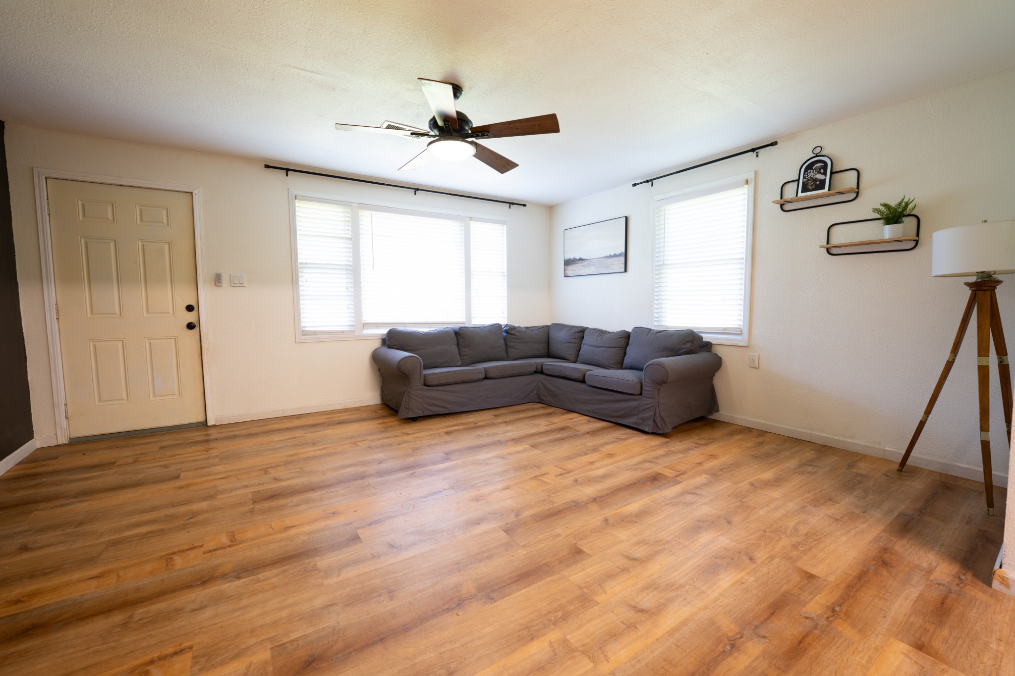 8247 Pinewood Road Nunnelly, TN 37137 - Photo 5 of 14 a living room with furniture and a wooden floor
