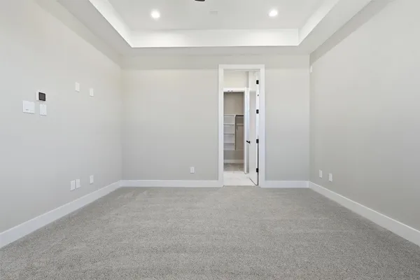 a bathroom with double sink and a mirror