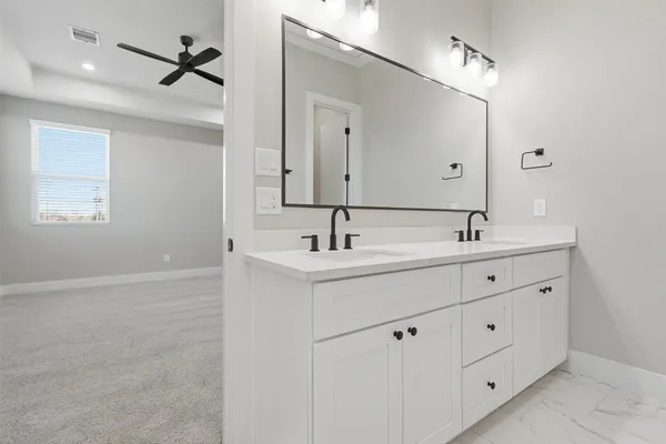 a bathroom with a toilet and a sink