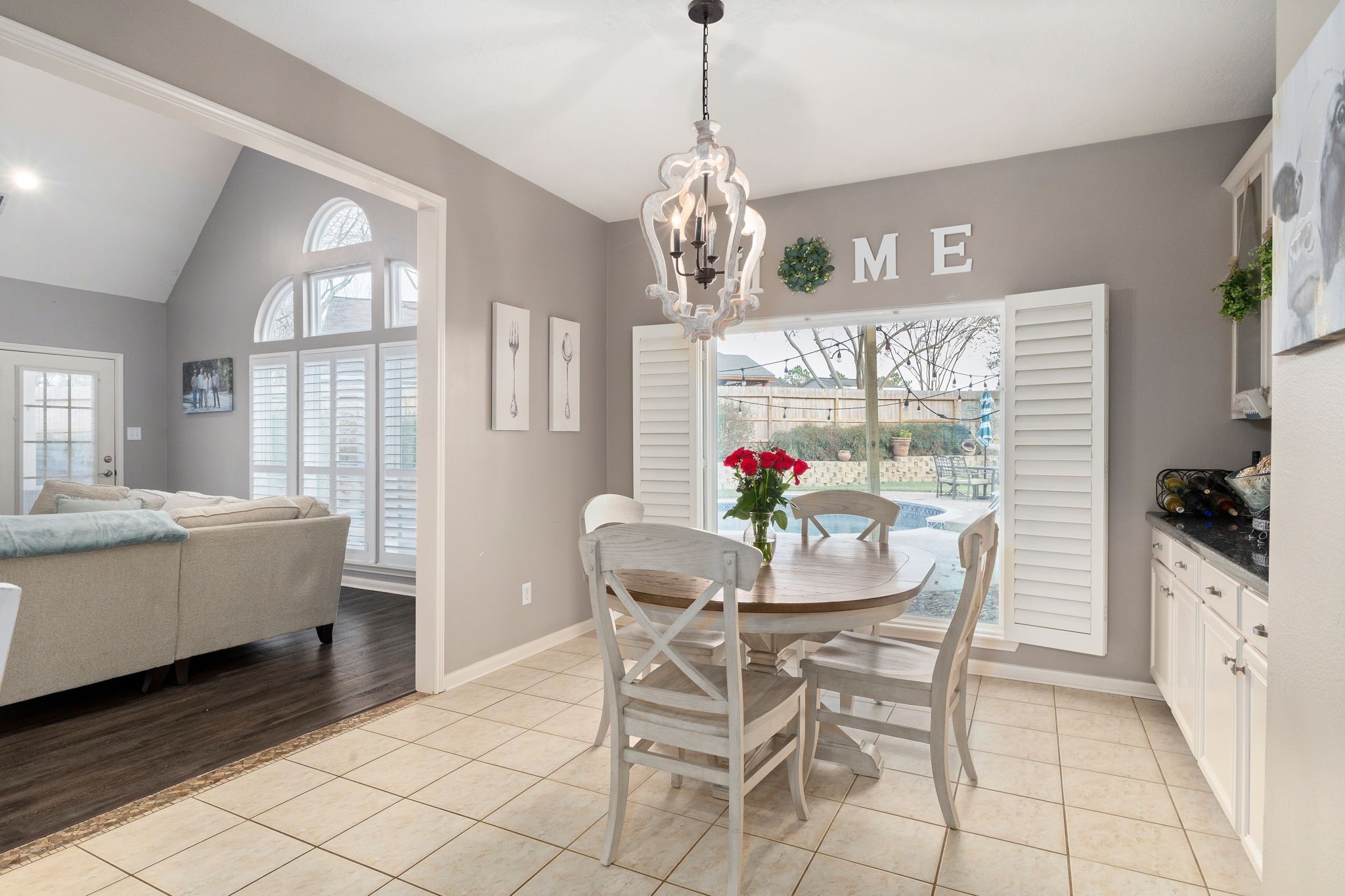 2709 Chase Street Brenham, TX 77833 - Photo 11 of 43 a view of a dining room with furniture and a chandelier