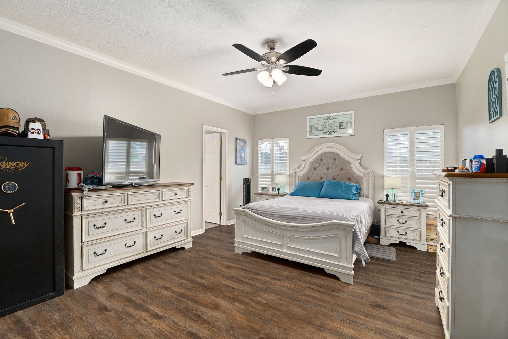 2709 Chase Street Brenham, TX 77833 - Photo 15 of 43 a bedroom with a bed and a dresser