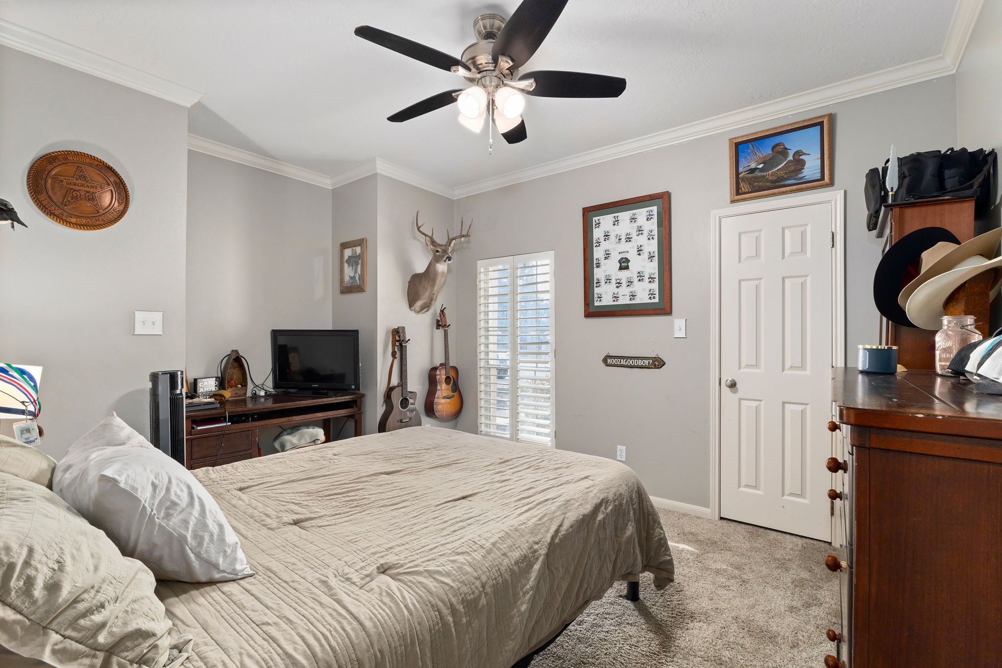 2709 Chase Street Brenham, TX 77833 - Photo 22 of 43 a bedroom with a bed and a television