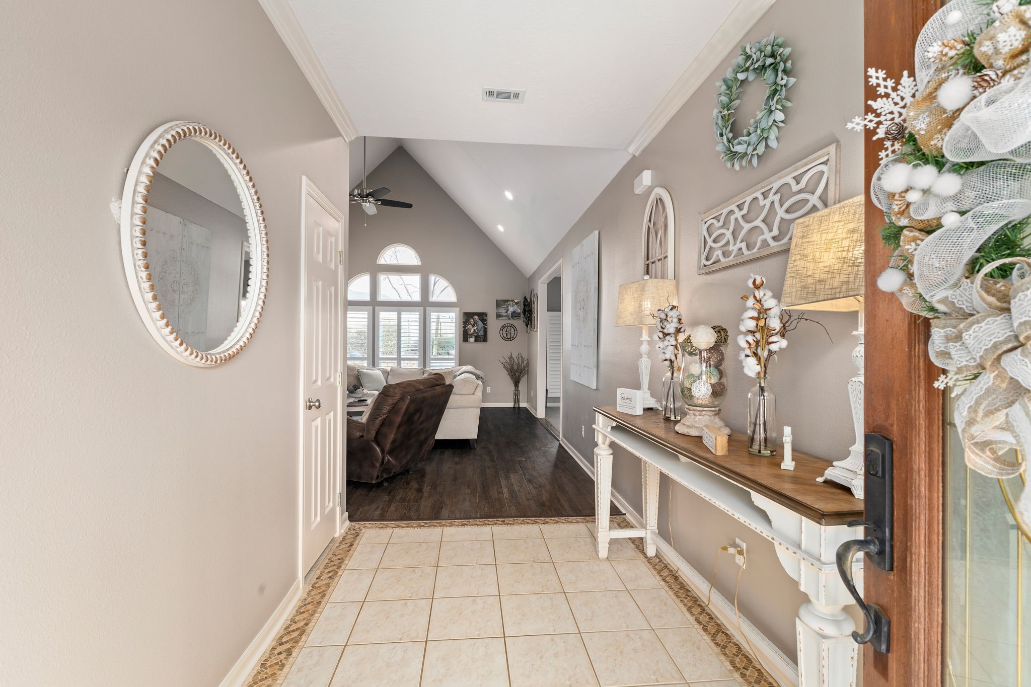 2709 Chase Street Brenham, TX 77833 - Photo 3 of 43 a bathroom with a sink a mirror and a shower