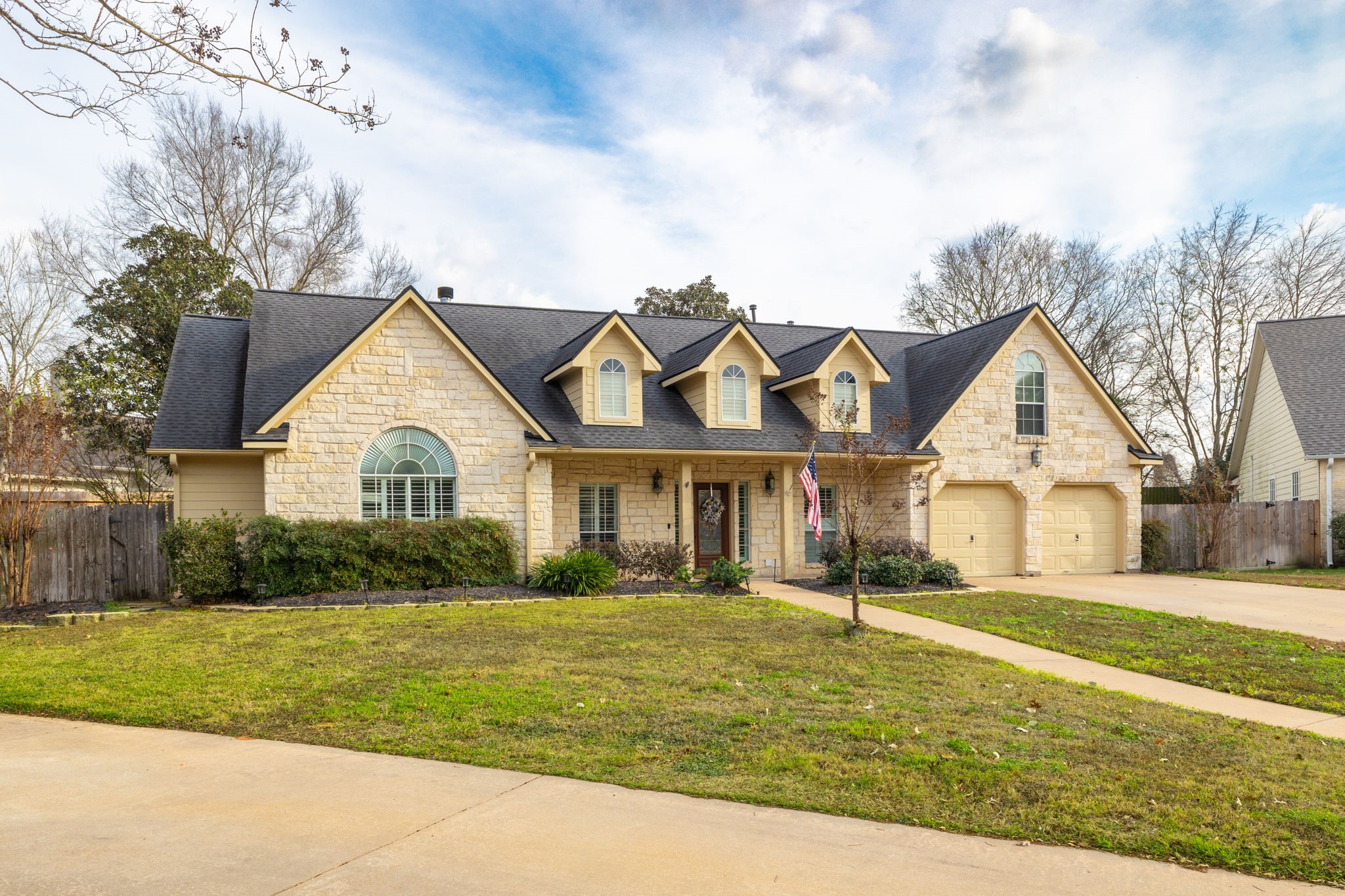 2709 Chase Street Brenham, TX 77833 - Photo 41 of 43 a front view of a house with a yard