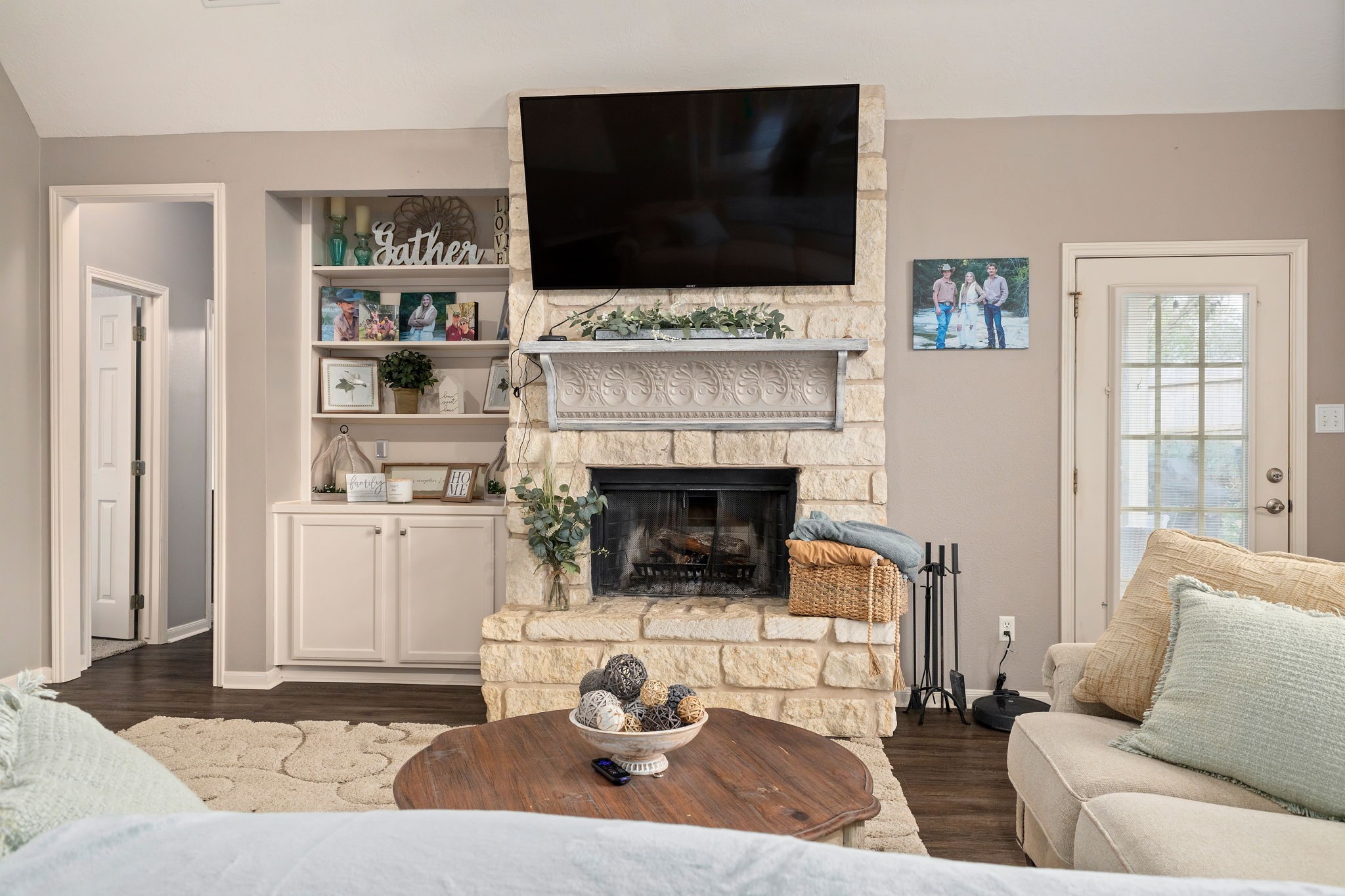 2709 Chase Street Brenham, TX 77833 - Photo 6 of 43 a living room with furniture fireplace and flat screen tv