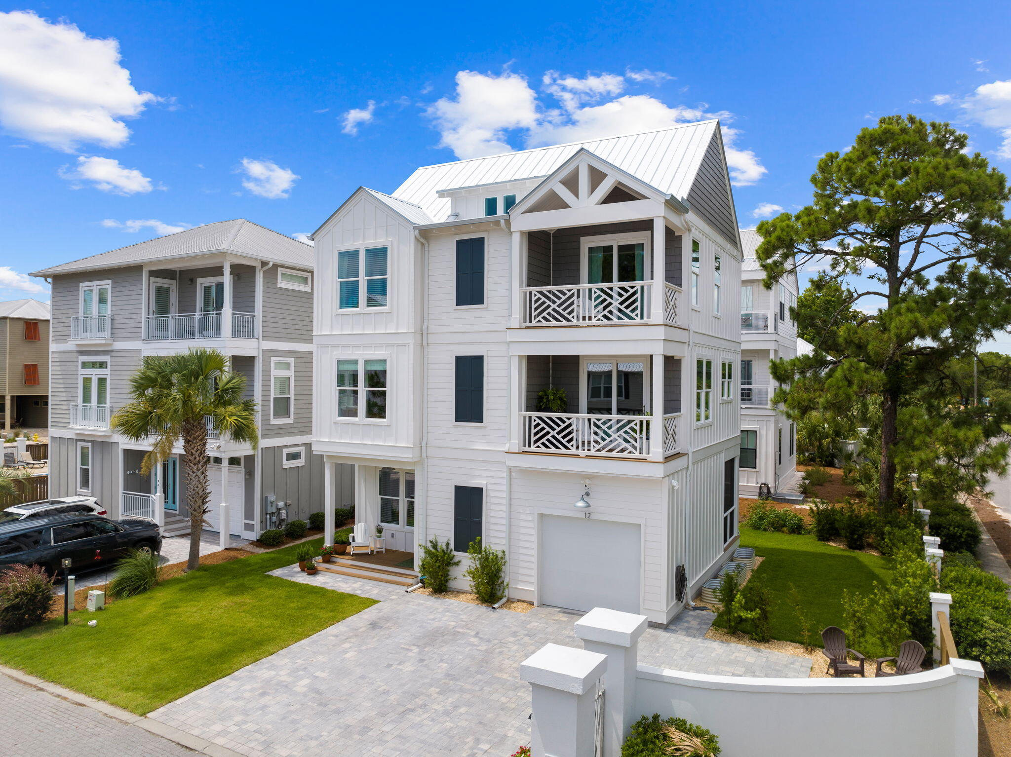 12 Sawgrass Lane Santa Rosa Beach, FL 32459 - Photo 2 of 70 a front view of a house with a yard