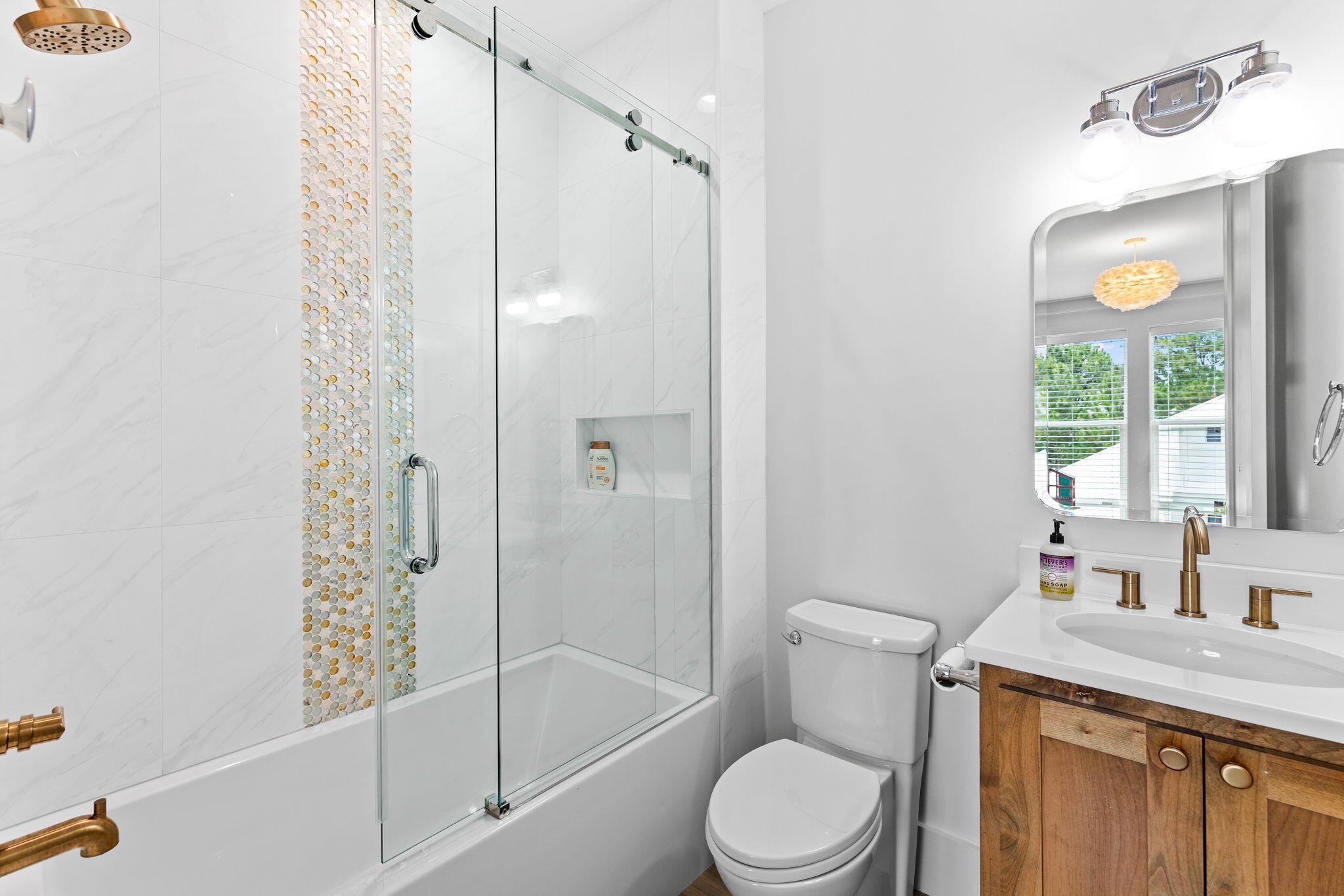 12 Sawgrass Lane Santa Rosa Beach, FL 32459 - Photo 49 of 70 a bathroom with a granite countertop toilet a sink and a bathtub