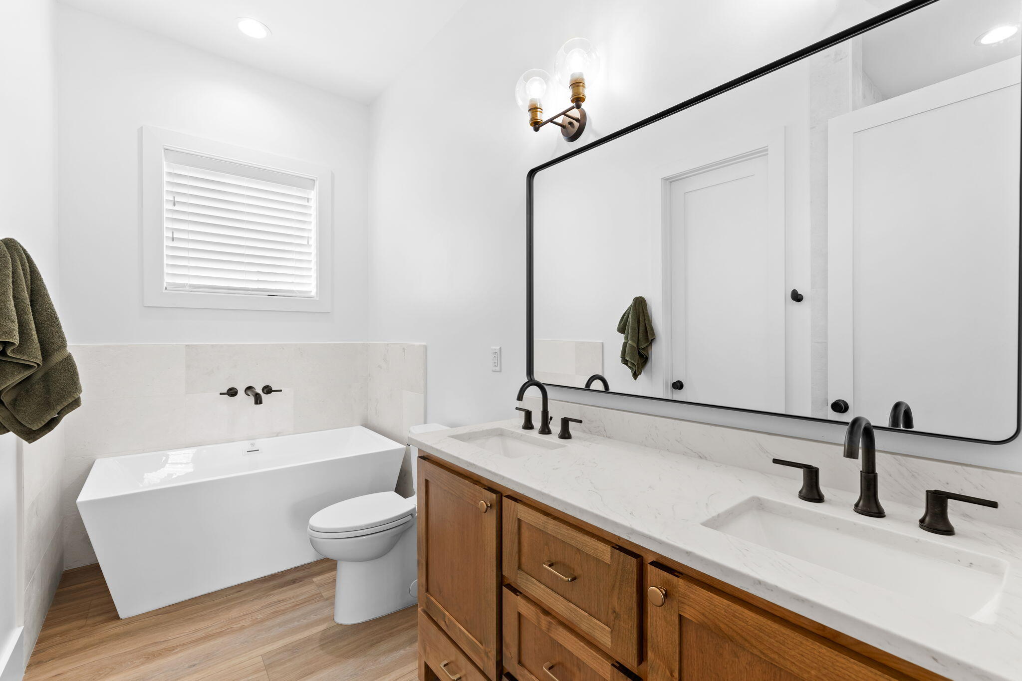 12 Sawgrass Lane Santa Rosa Beach, FL 32459 - Photo 59 of 70 a bathroom with a double vanity sink and a bathtub