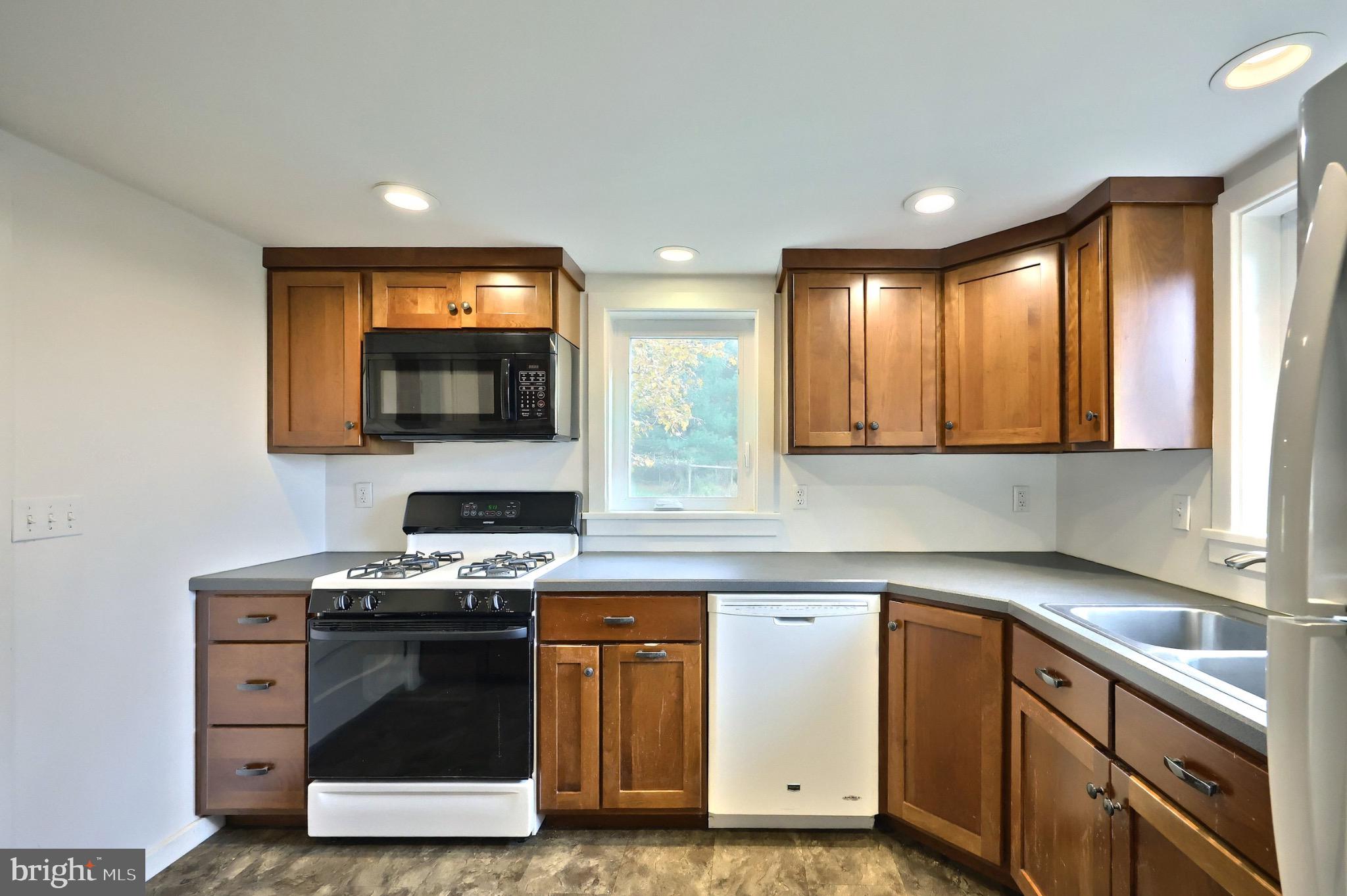 4599 Carlisle Road Gardners, PA 17324 - Photo 20 of 48 Modern kitchen with warm wood accents.