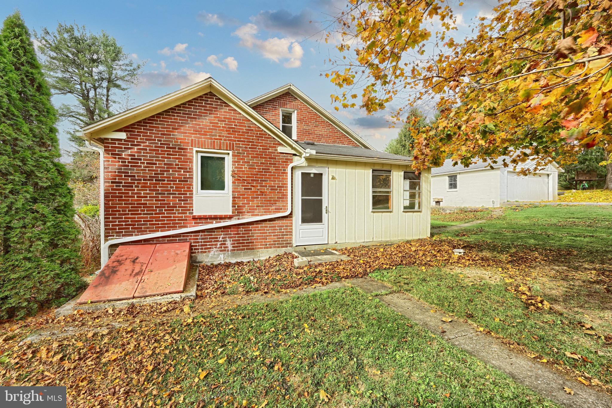 4599 Carlisle Road Gardners, PA 17324 - Photo 40 of 48 Charming brick home with autumn foliage.