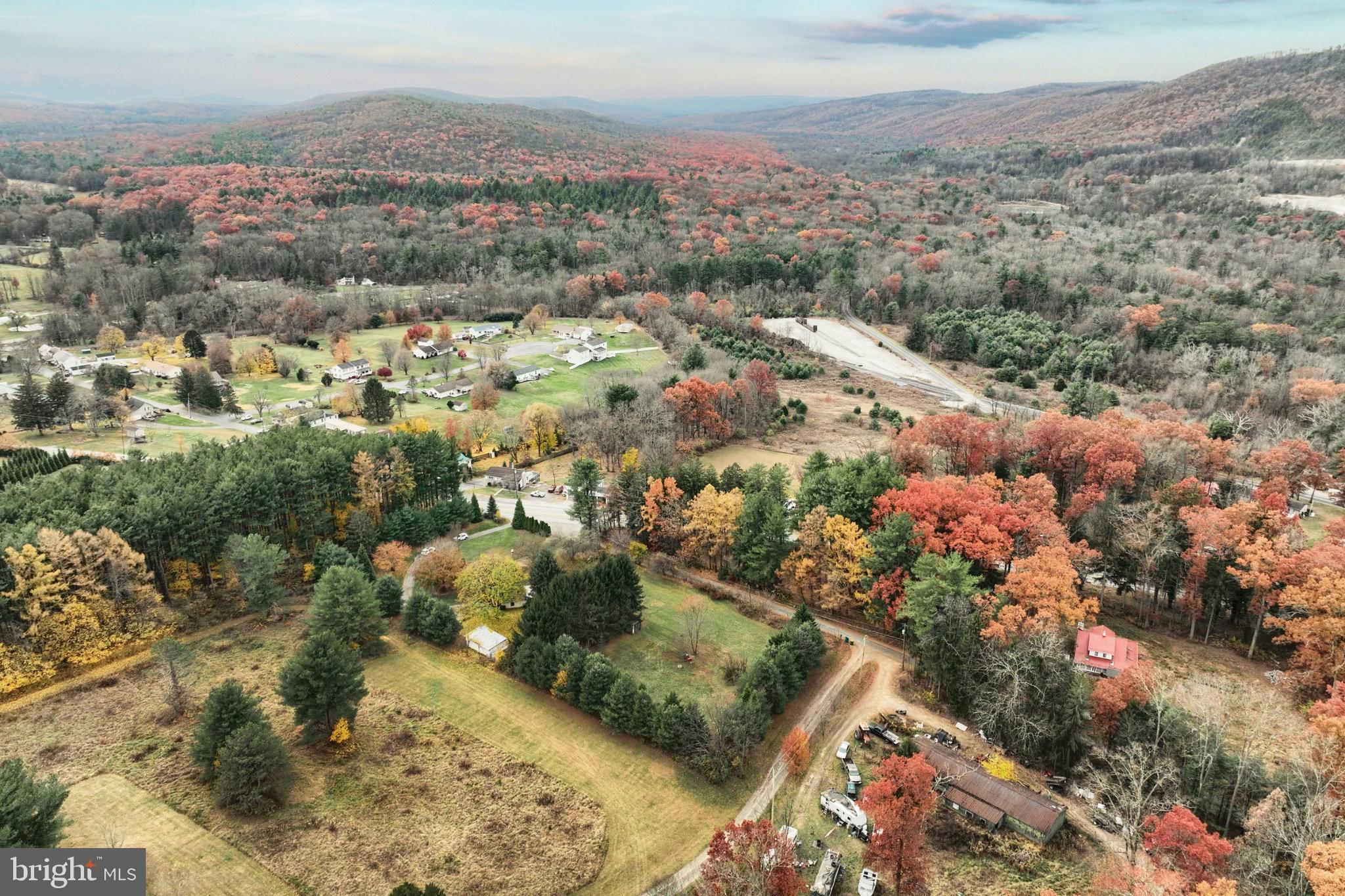 4599 Carlisle Road Gardners, PA 17324 - Photo 6 of 48 Autumn hues blanket a serene landscape.