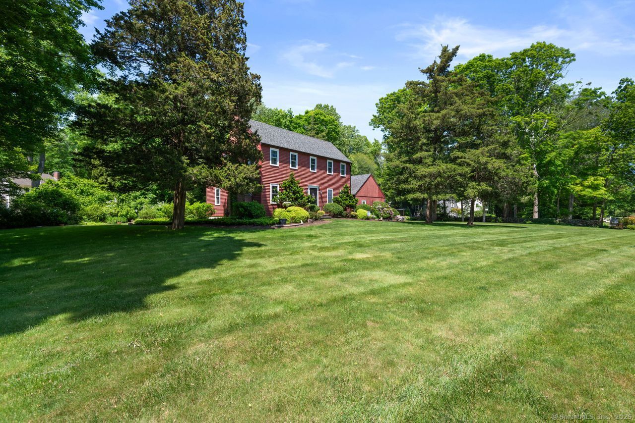 a view of a house with a big yard