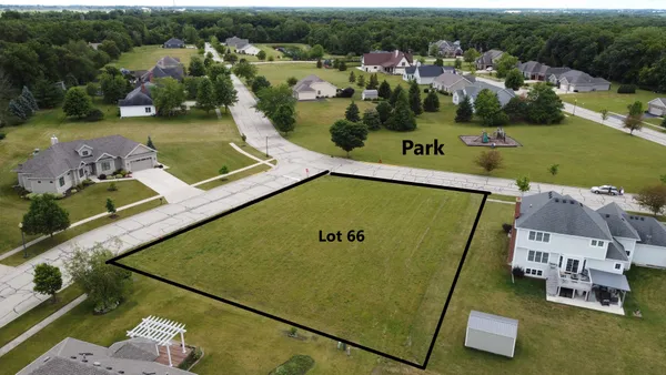 an aerial view of a house with a garden