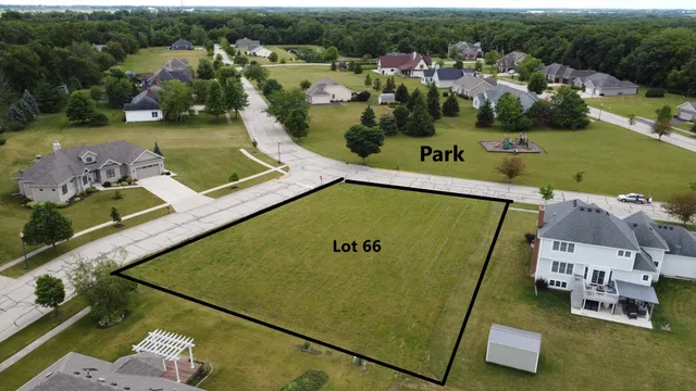 an aerial view of a house with a garden