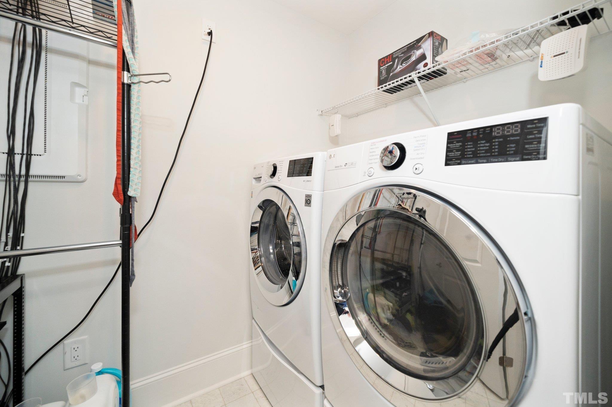 3271 Ripley River Road New Hill, NC 27562 - Photo 31 of 48 a utility room with dryer and washer