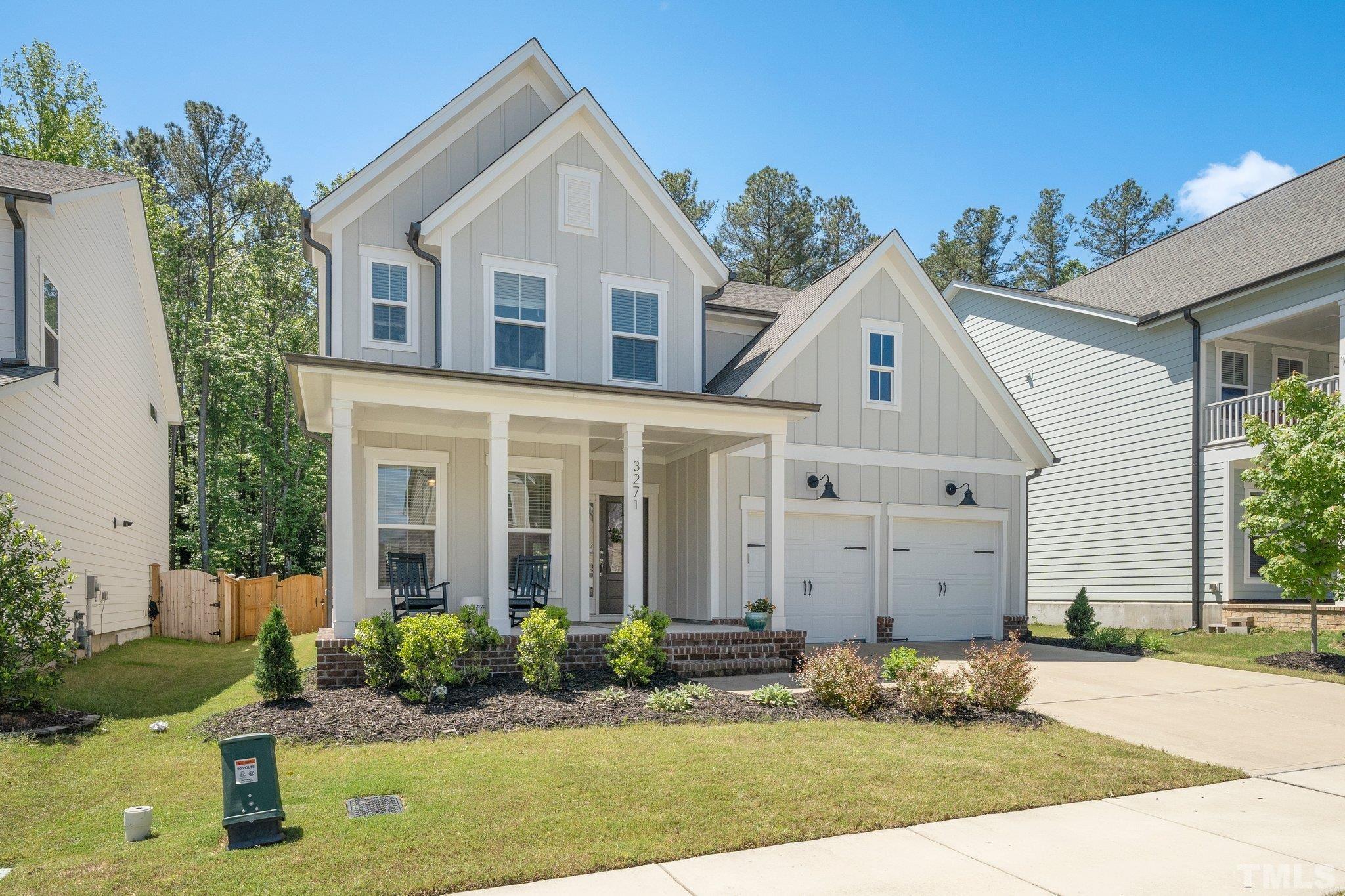 3271 Ripley River Road New Hill, NC 27562 - Photo 47 of 48 a front view of a house with garden