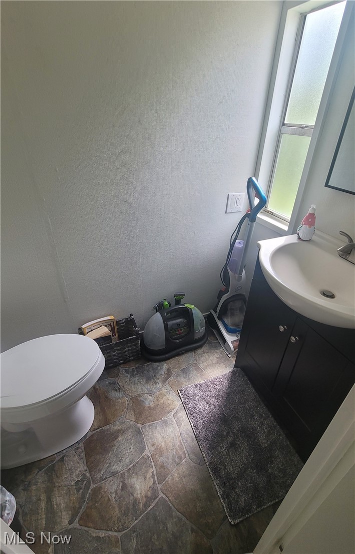 18592 Edwards Road Doylestown, OH 44230 - Photo 7 of 21 Half bath with vanity and toiliet