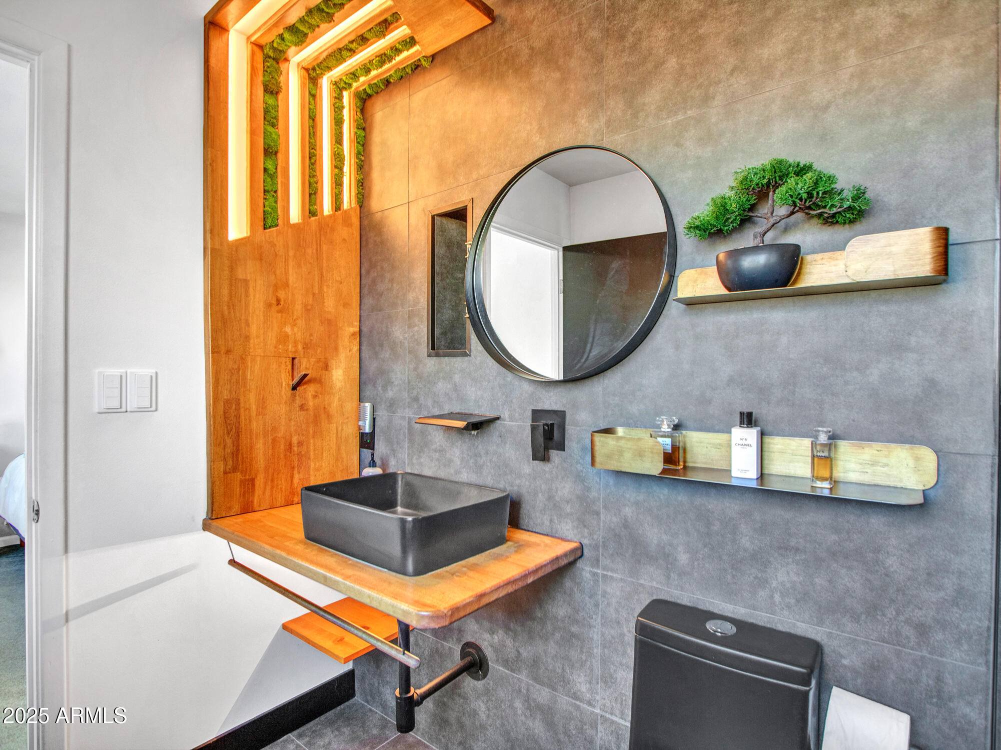 3010 East Yucca Street Phoenix, AZ 85028 - Photo 9 of 58 a bathroom with a sink and a mirror