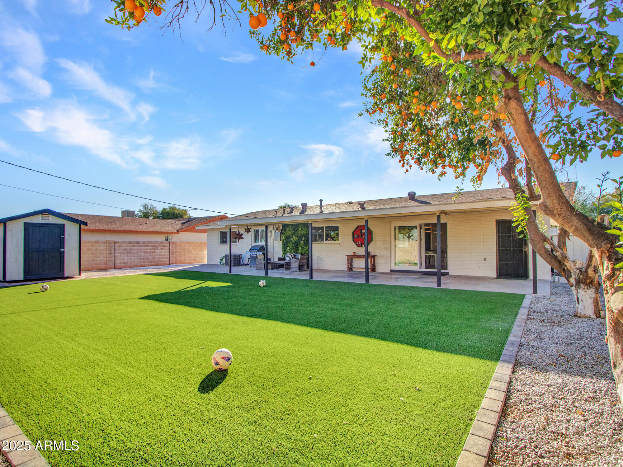3010 East Yucca Street Phoenix, AZ 85028 - Photo 12 of 58 a view of a house with backyard