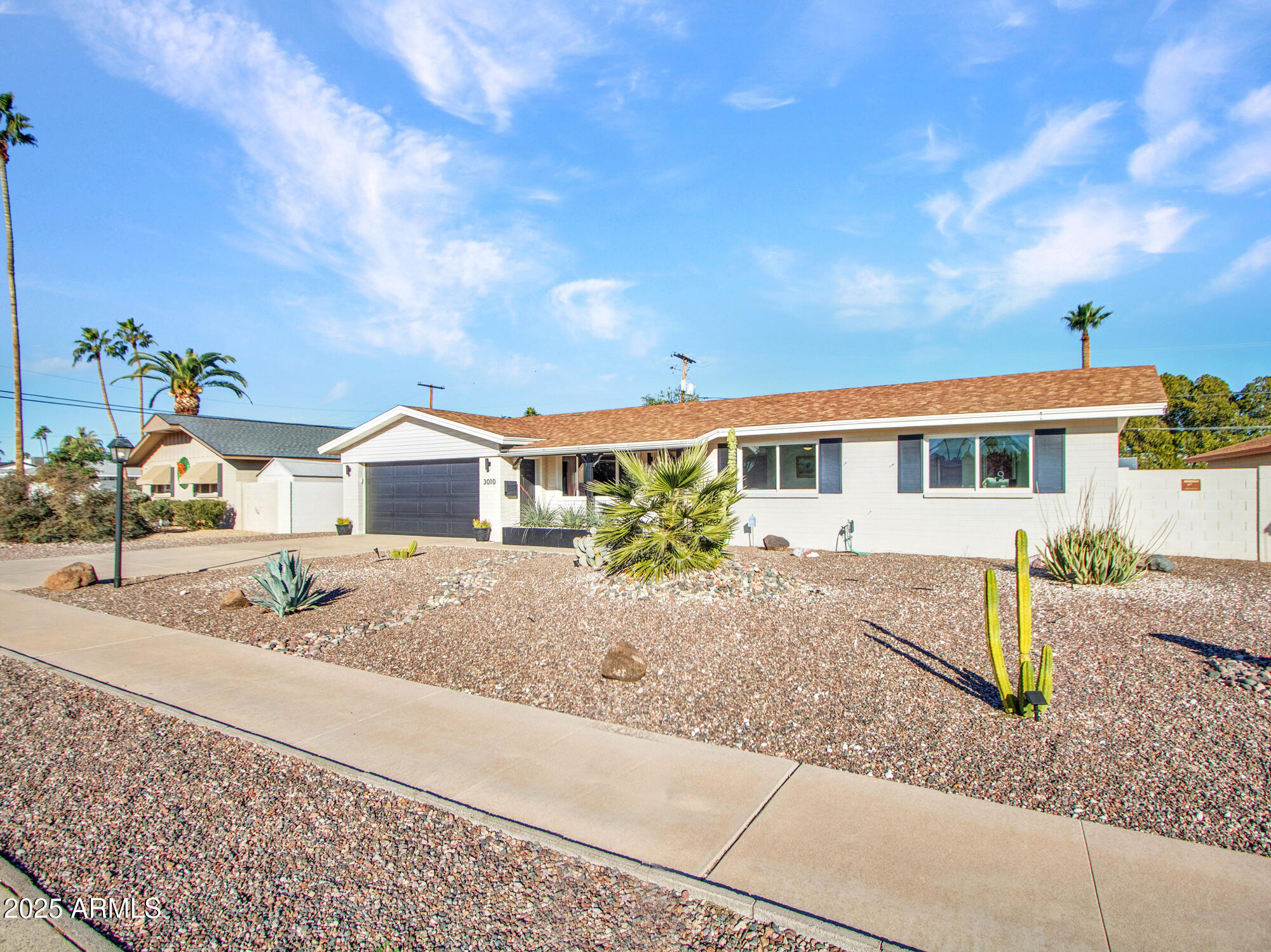 3010 East Yucca Street Phoenix, AZ 85028 - Photo 18 of 58 a front view of a house with garden
