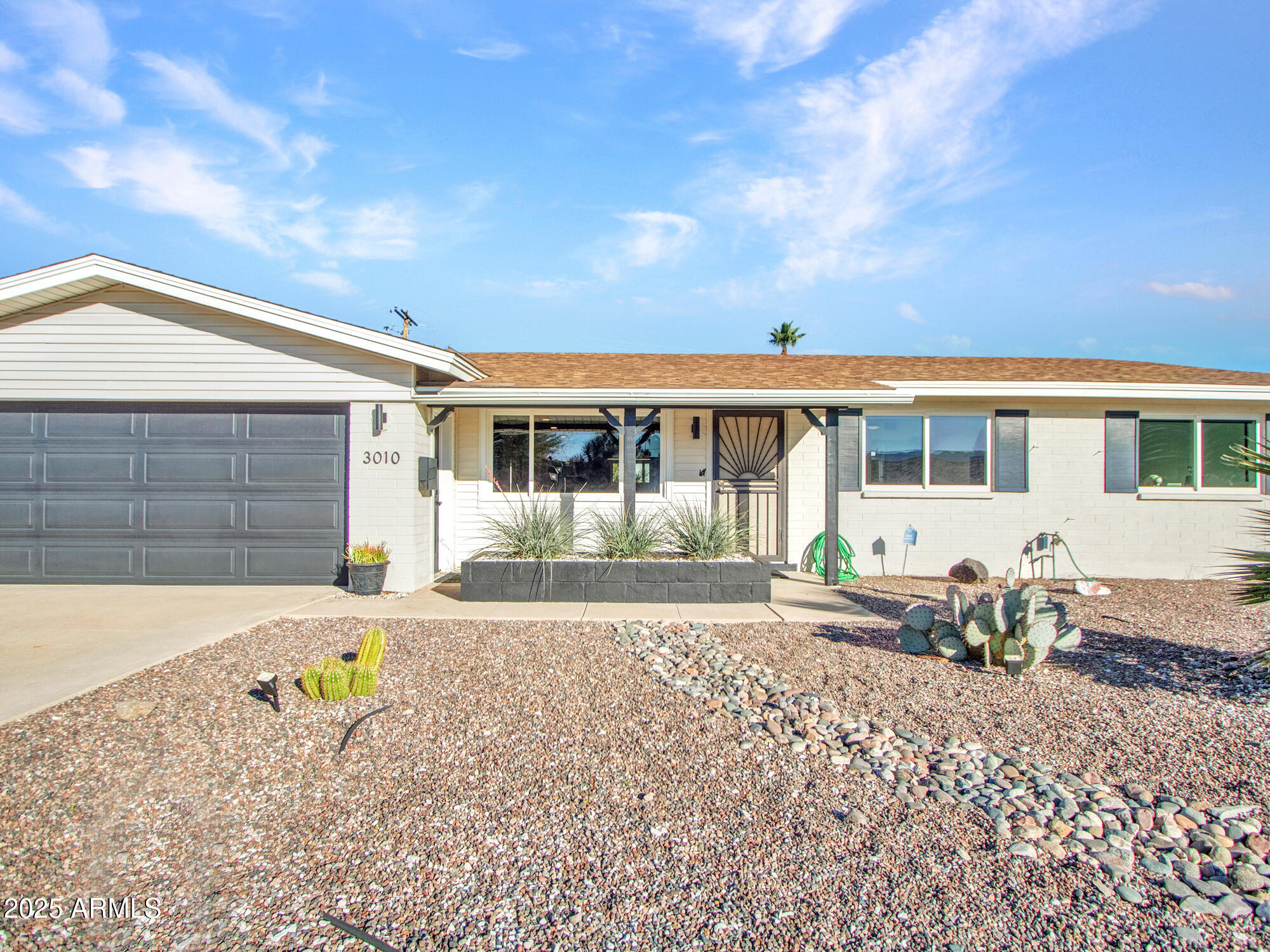 3010 East Yucca Street Phoenix, AZ 85028 - Photo 19 of 58 a front view of a house with a sitting area