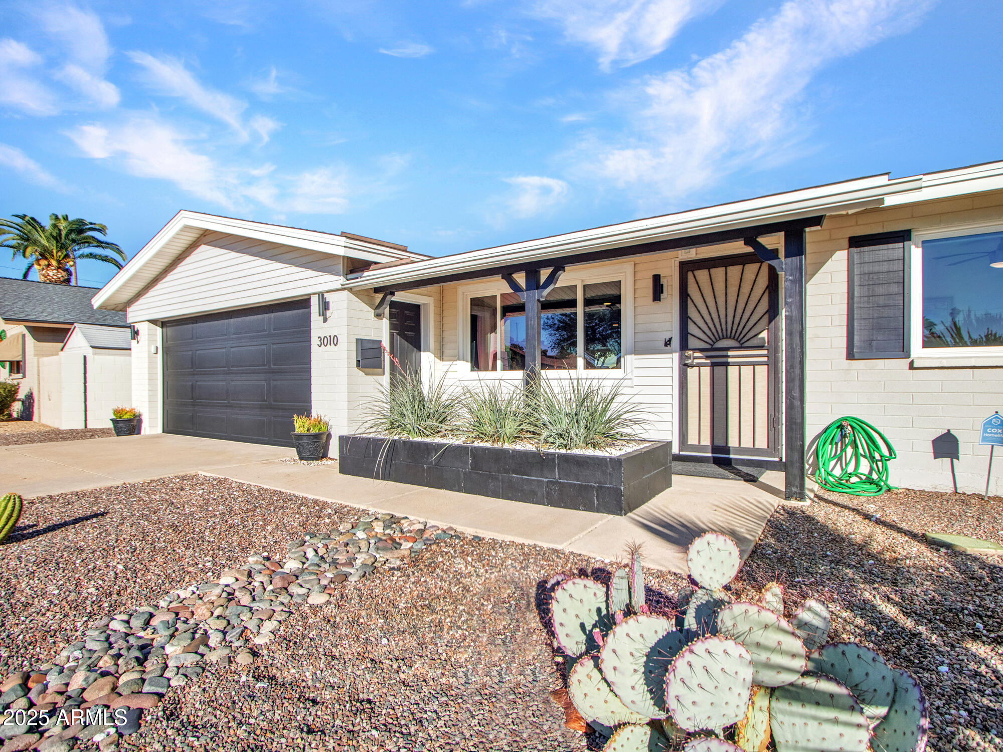 3010 East Yucca Street Phoenix, AZ 85028 - Photo 20 of 58 a front view of a house with garden