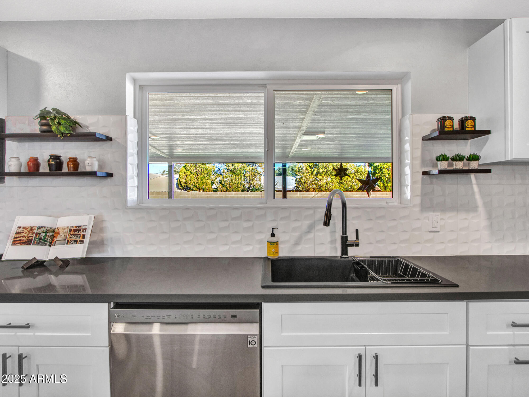 3010 East Yucca Street Phoenix, AZ 85028 - Photo 25 of 58 a kitchen with a sink and a window