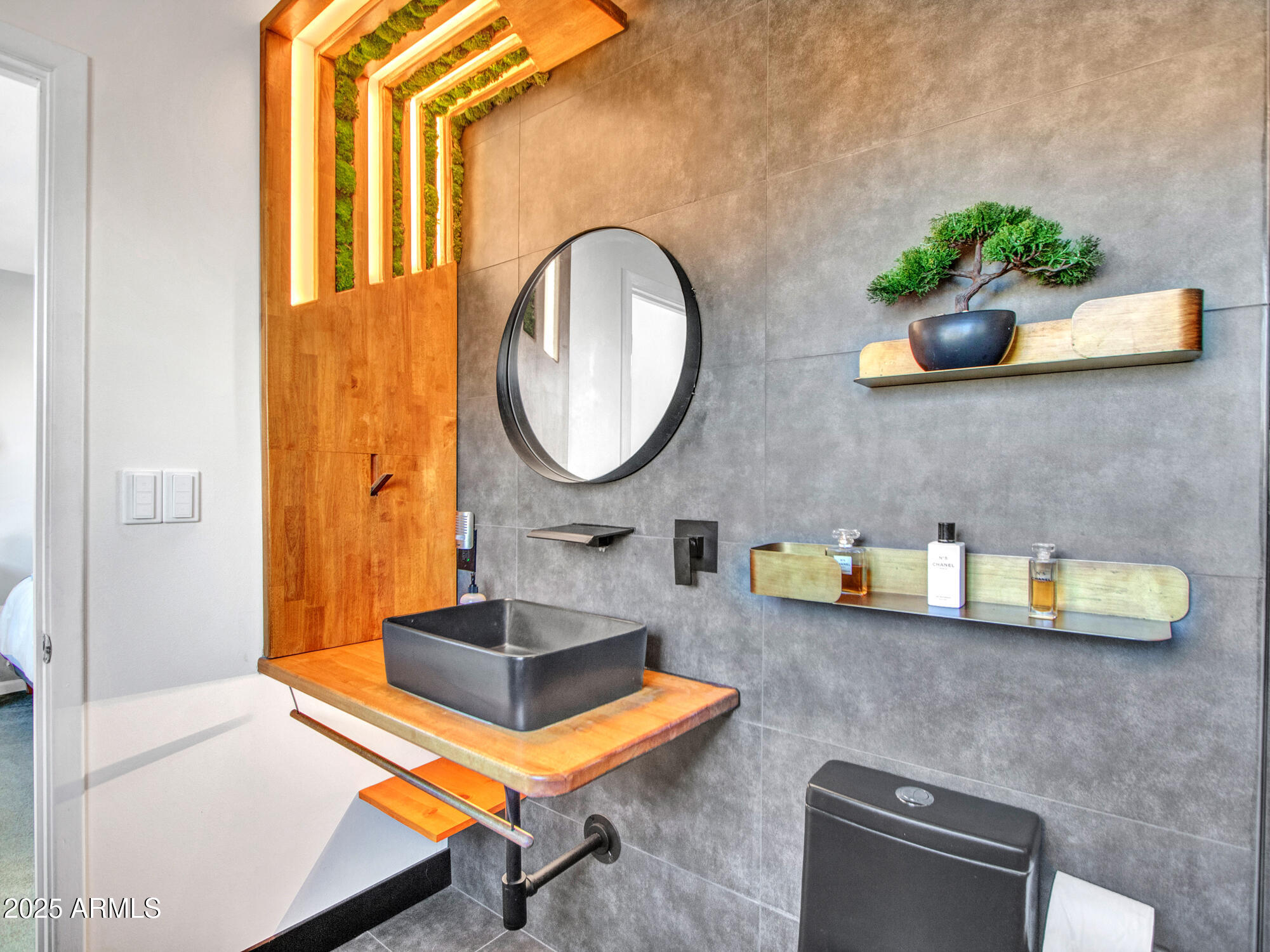 3010 East Yucca Street Phoenix, AZ 85028 - Photo 32 of 58 a bathroom with a sink and a mirror