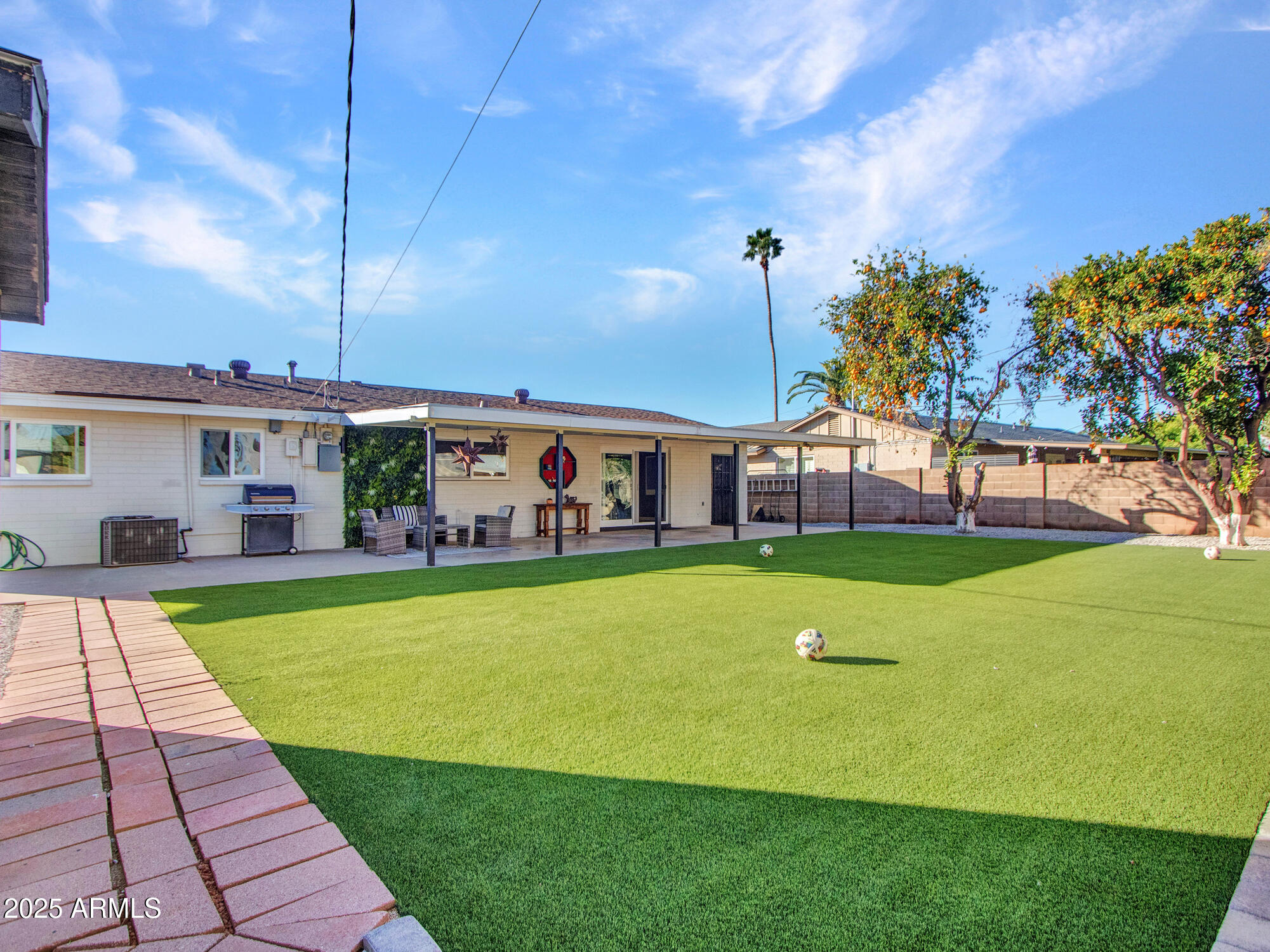 3010 East Yucca Street Phoenix, AZ 85028 - Photo 42 of 58 a view of a house with a swimming pool