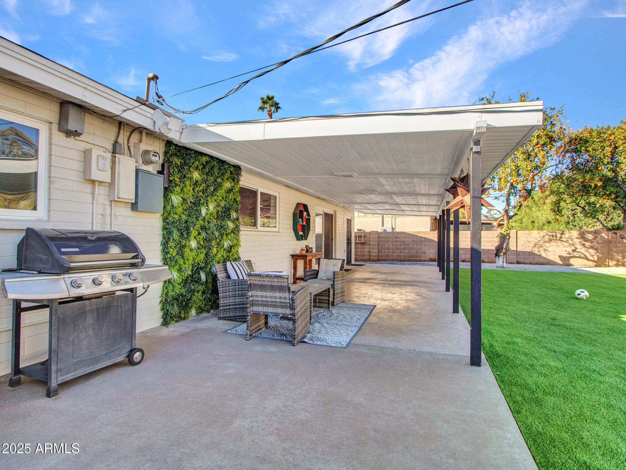 3010 East Yucca Street Phoenix, AZ 85028 - Photo 45 of 58 a view of a patio with table and chairs and potted plants