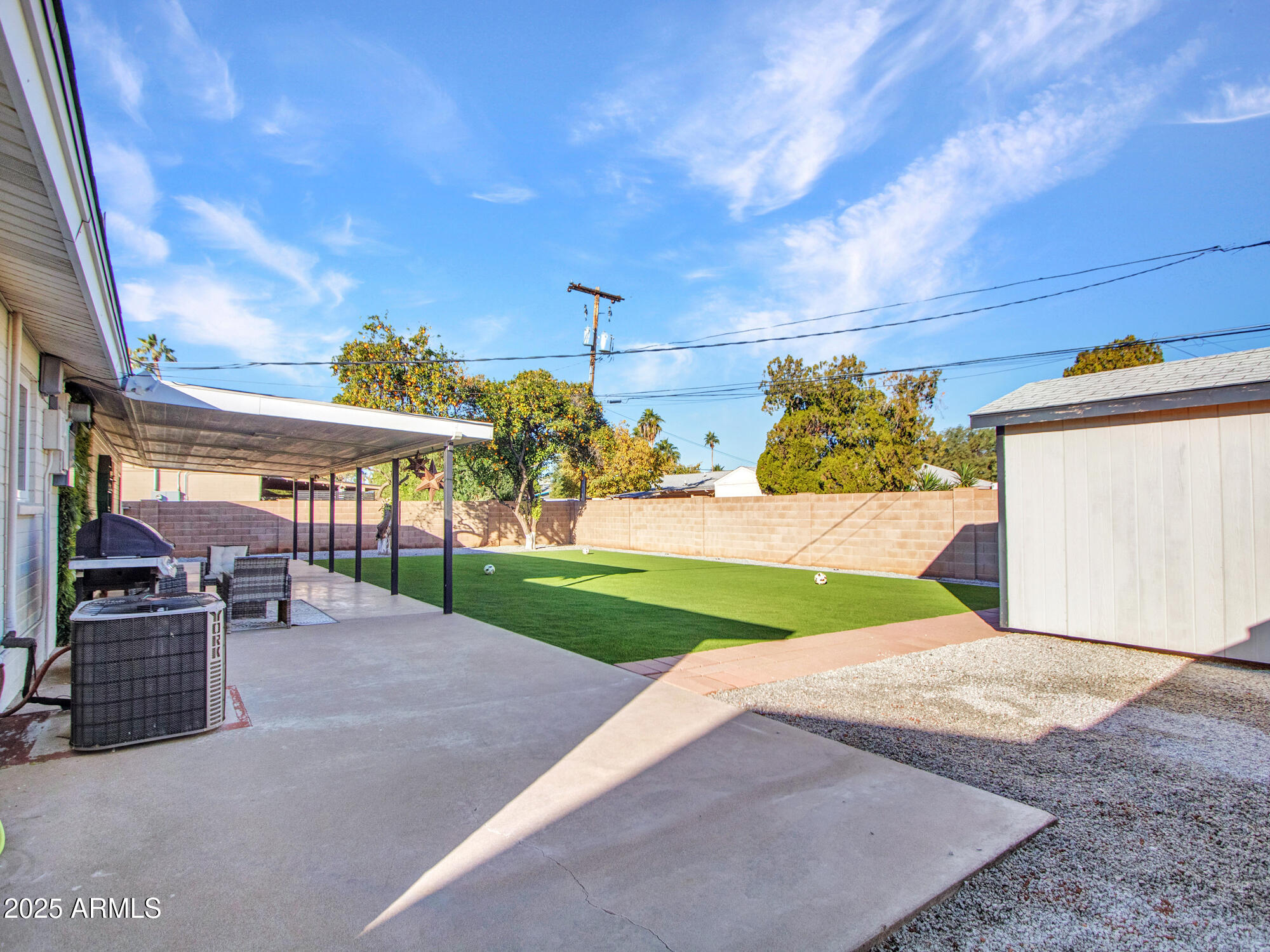 3010 East Yucca Street Phoenix, AZ 85028 - Photo 46 of 58 a view of a backyard with a patio