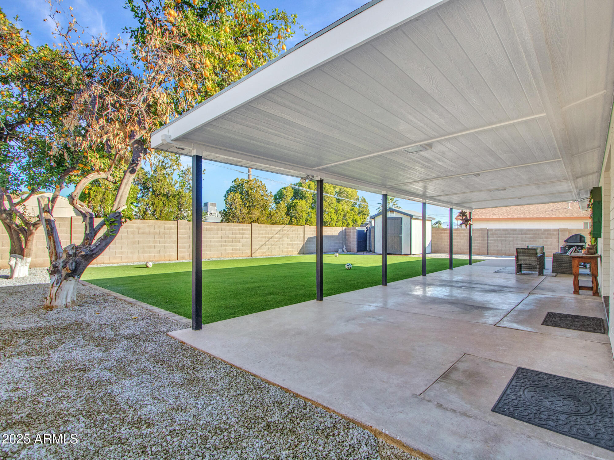 3010 East Yucca Street Phoenix, AZ 85028 - Photo 47 of 58 a view of a house with backyard and entertaining space