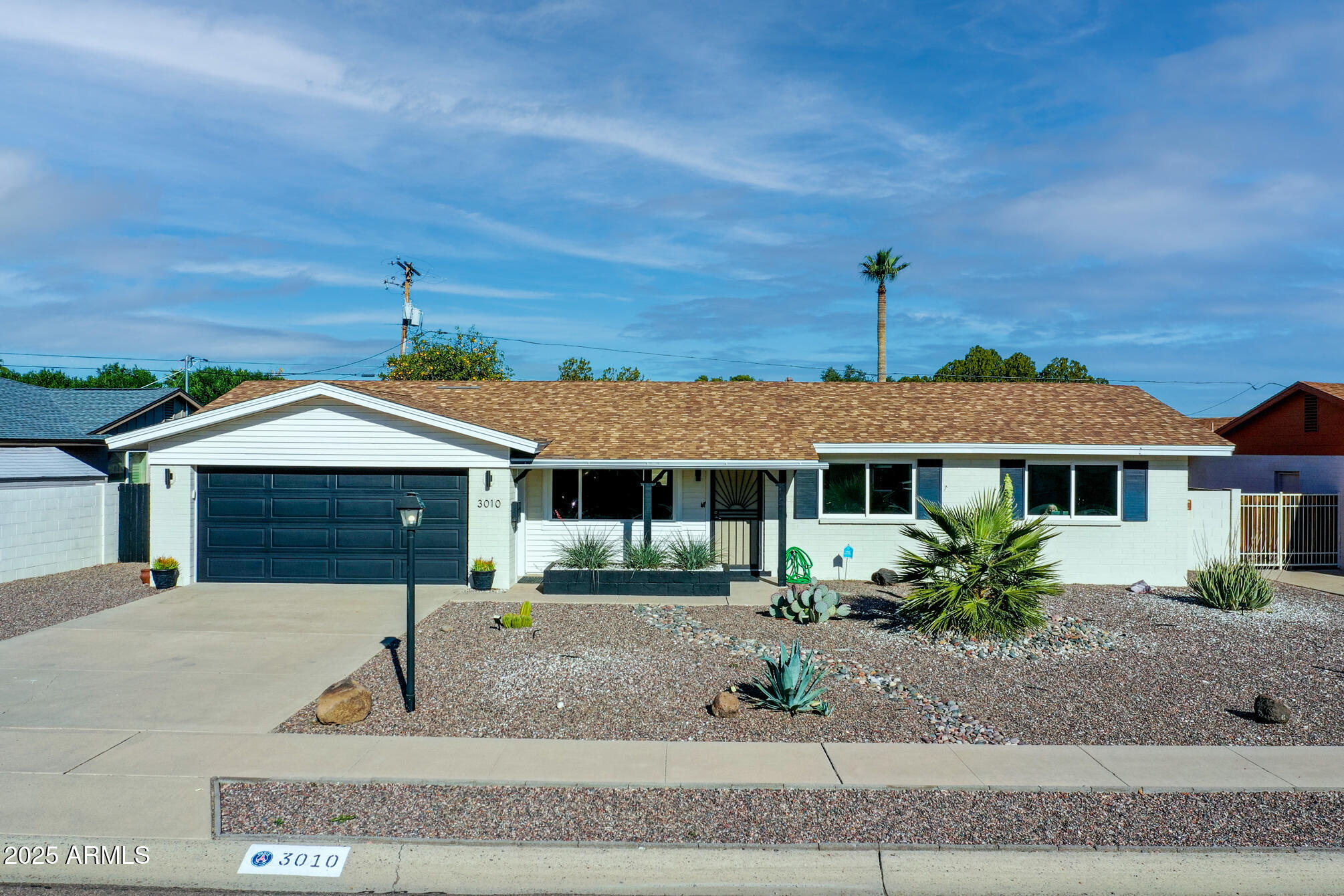 3010 East Yucca Street Phoenix, AZ 85028 - Photo 50 of 58 a front view of a house with garden