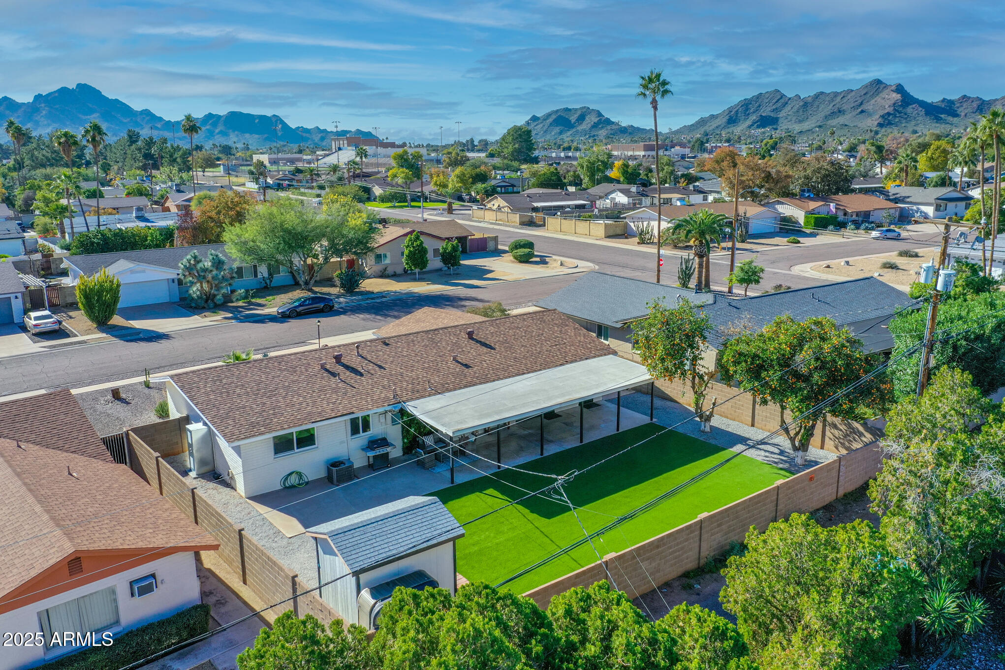 3010 East Yucca Street Phoenix, AZ 85028 - Photo 53 of 58 an aerial view of a house with a big yard