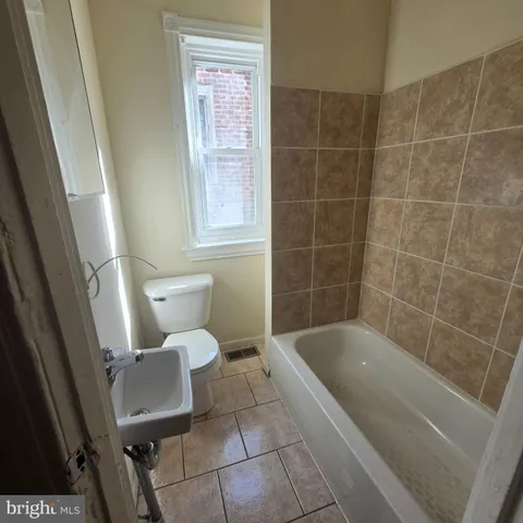 a bathroom with a sink and a toilet
